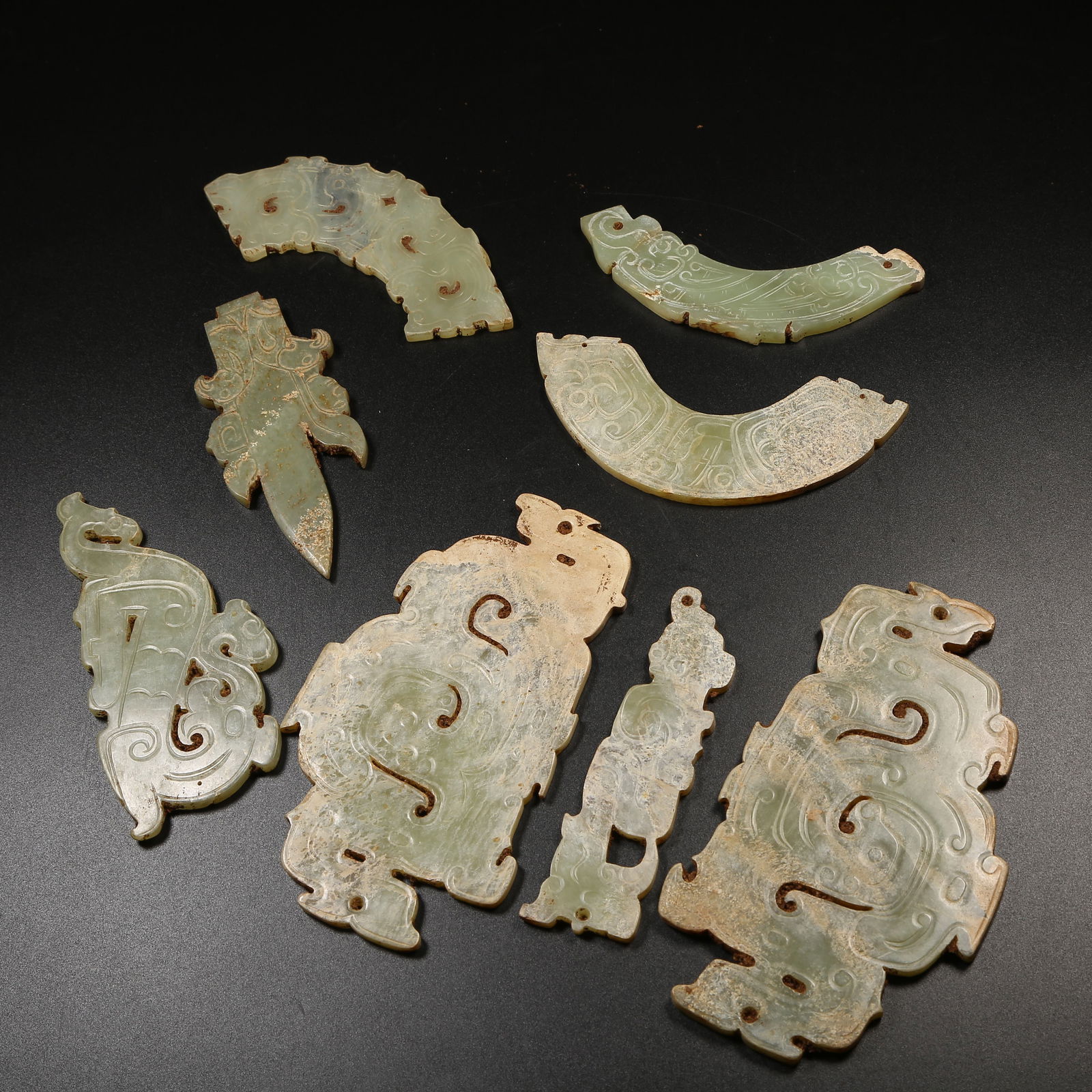 A ANCIENT JADE PENDANT SET: Ancient Jade Pendant Set