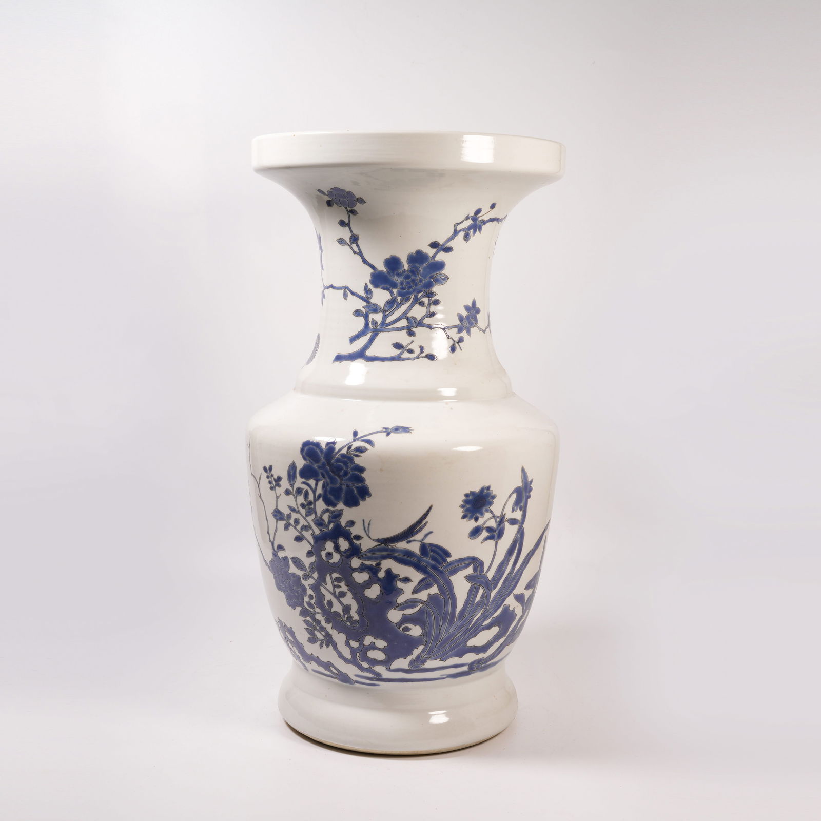 A FAMILLE-ROSE DISH-MOUTHED VASE WITH FLOWER-AND-BUTTERFLY DESIGN: Famille-Rose Dish-Mouthed Vase with Flower-and-Butterfly Design