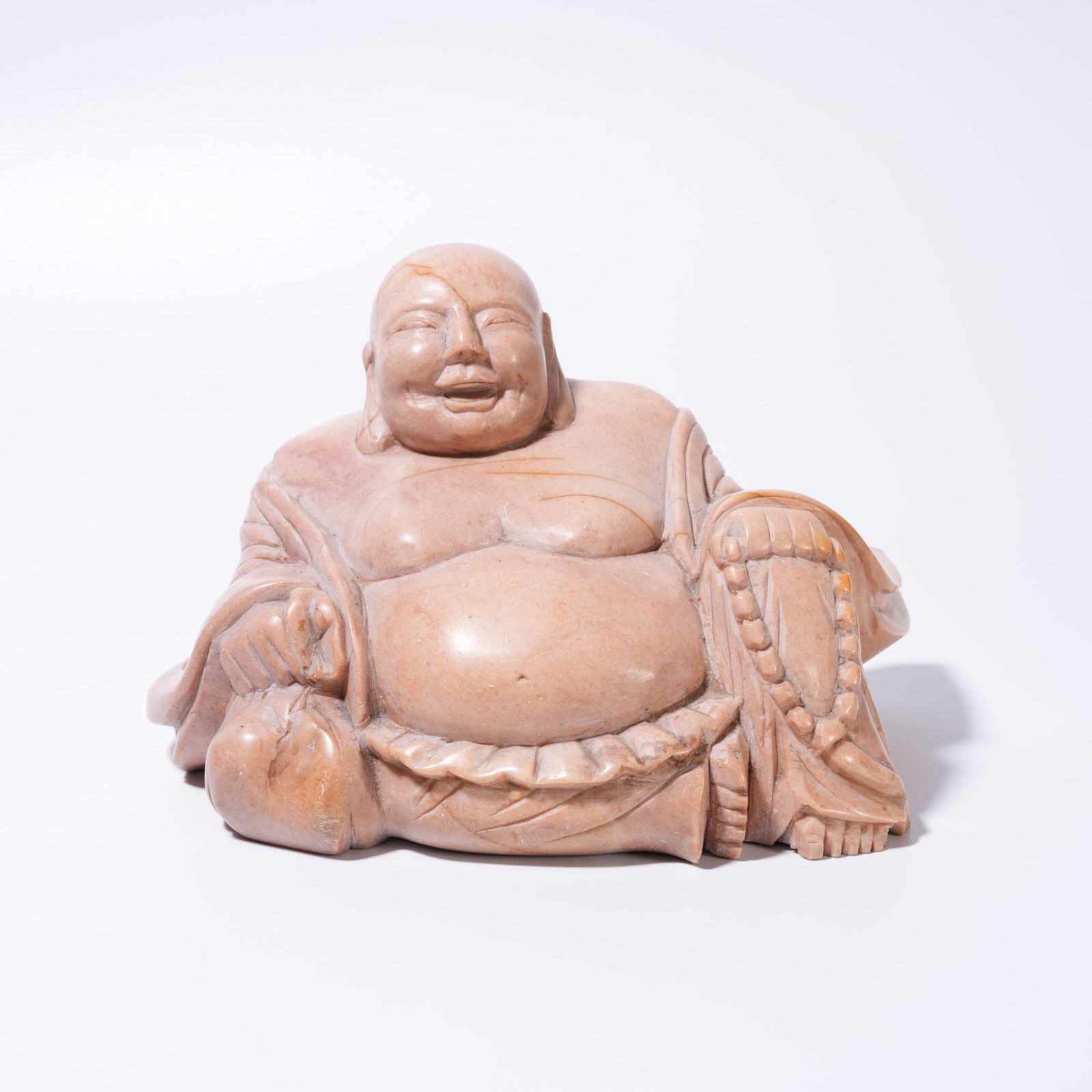 A STONE CARVED MAITREYA BUDDHA FIGURE (1 of 10)