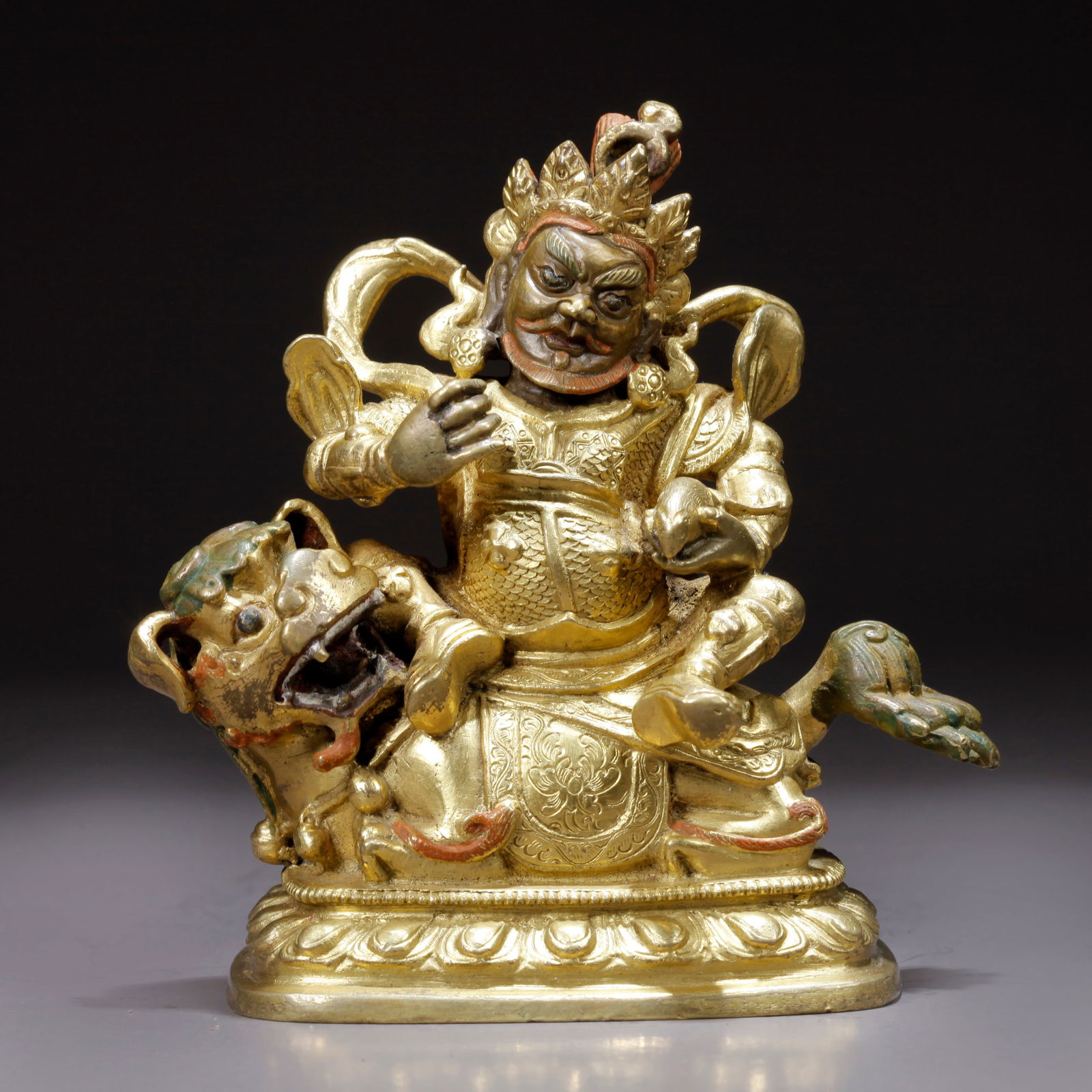 A GILDED BRONZE WEALTH GOD STATUE (1 of 9)