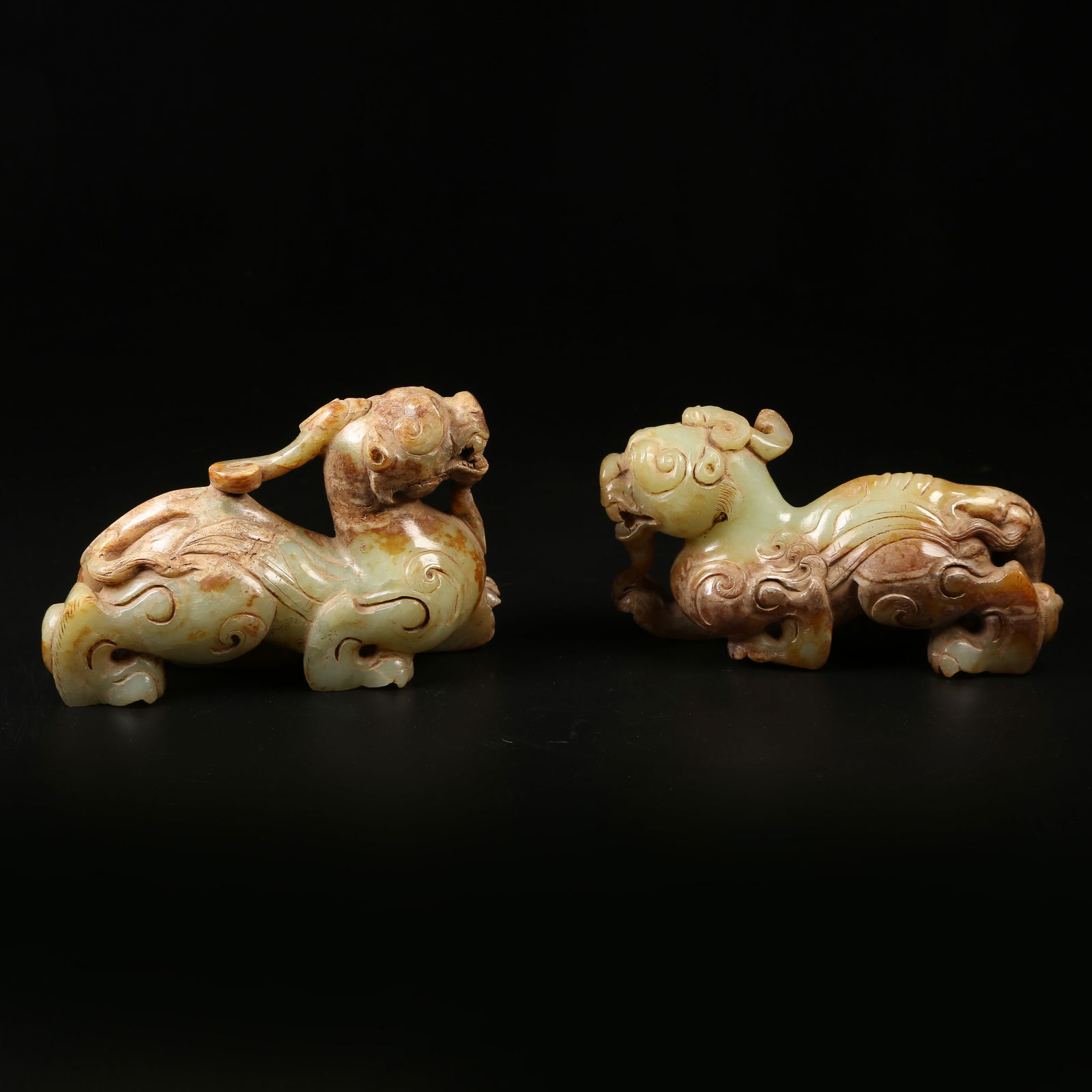 A SET OF ANCIENT JADE AUSPICIOUS BEASTS: Set of Ancient Jade Auspicious Beasts