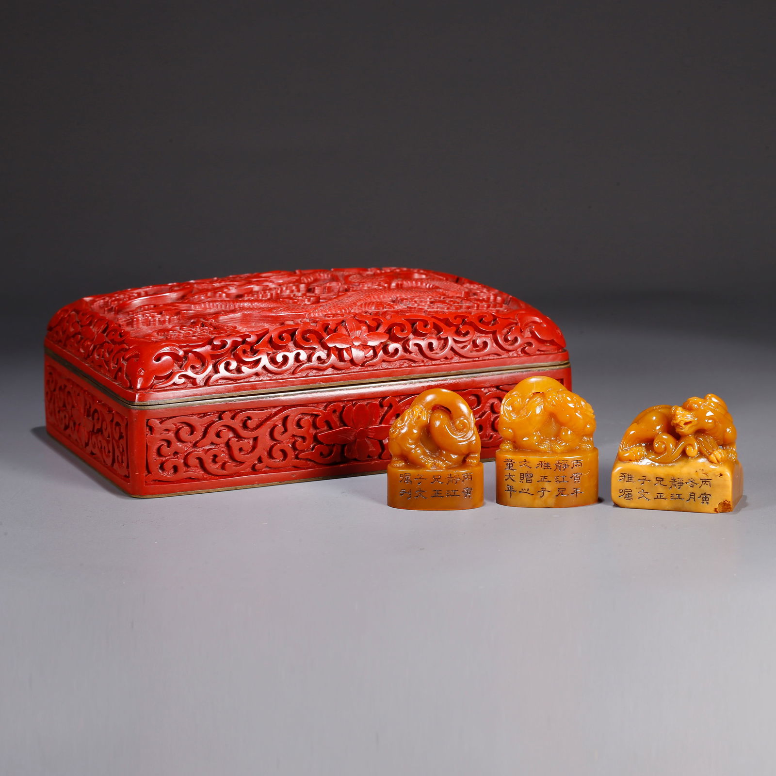 A SHOUSHAN TIANHUANG STONE CARVED TIGER FINIAL SEAL (A SET): Shoushan Tianhuang stone carved tiger finial seal (a set)