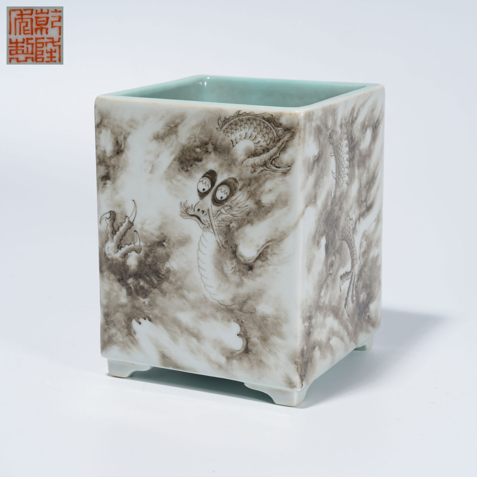 A INK-AND-COLOR BRUSH POT WITH CLOUD-AND-DRAGON MOTIF: Ink-and-Color Brush Pot with Cloud-and-Dragon Motif