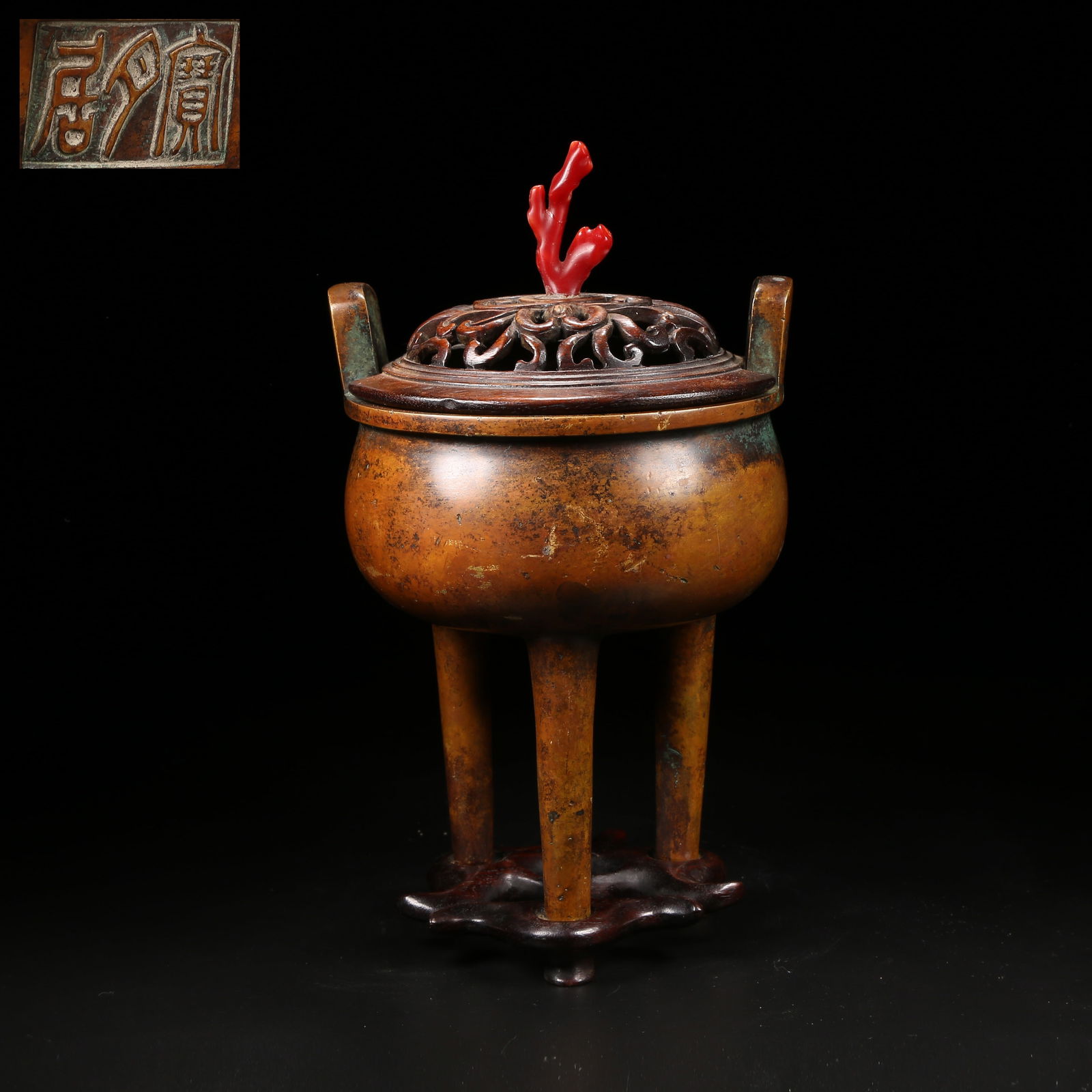 A BRONZE THREE-LEGGED CENSER WITH UPWARD-RISING HANDLES: Bronze Three-Legged Censer with Upward-Rising Handles