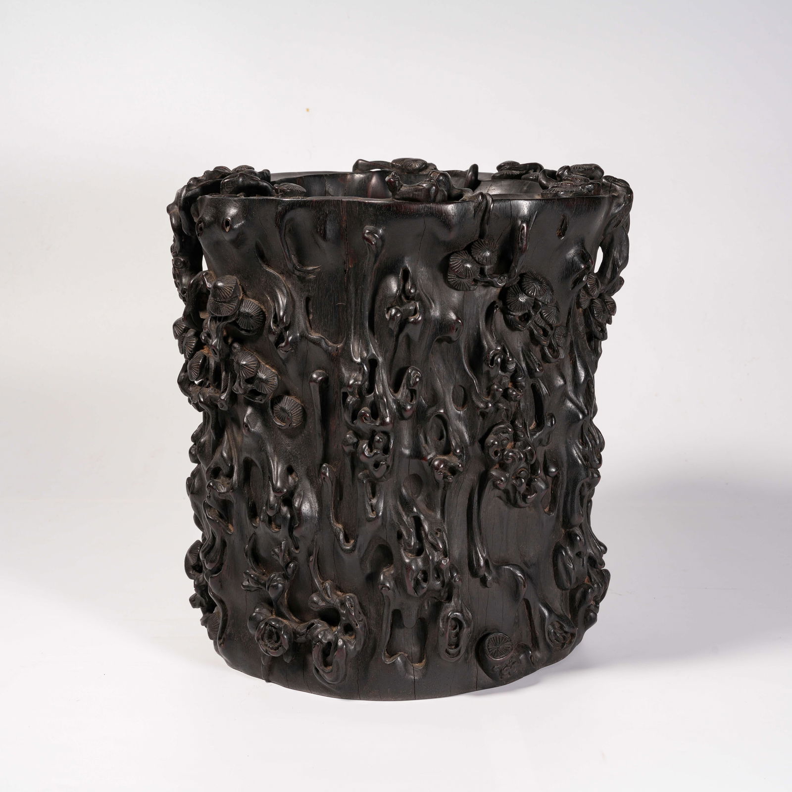 A ZITAN WOOD BURL BRUSH POT CARVED WITH PINE TREE MOTIF: Zitan Wood Burl Brush Pot Carved with Pine Tree Motif