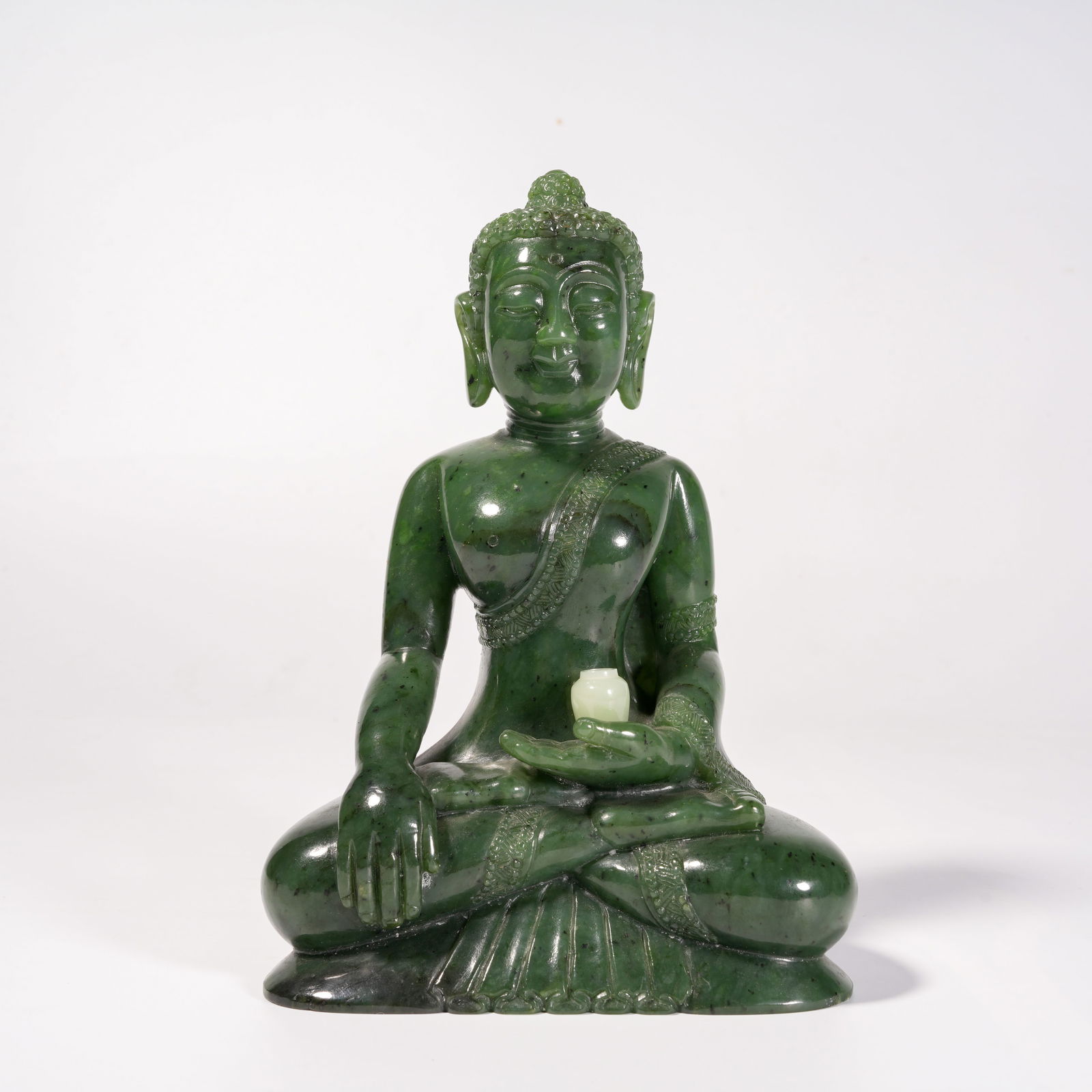 A SEATED MEDICINE BUDDHA STATUE IN HETIAN JADE (1 of 9)