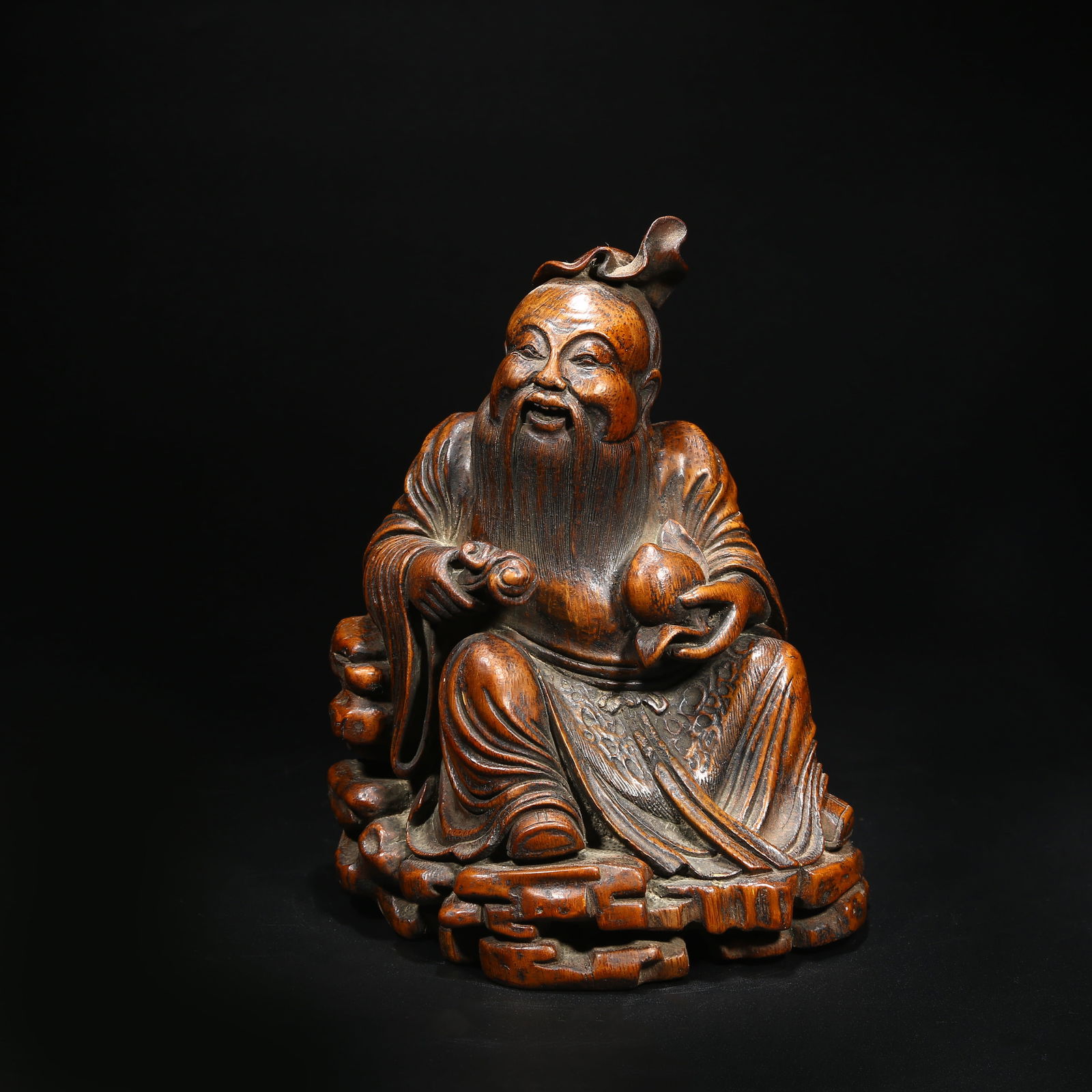 A BAMBOO ROOT CARVING FIGURE OF DONGFANG SHUO (1 of 8)