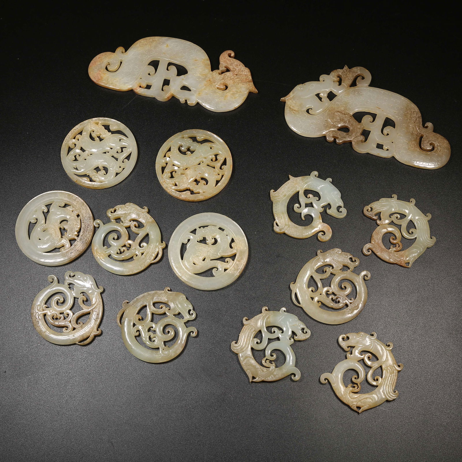 A ANCIENT JADE PENDANT SET: Ancient Jade Pendant Set