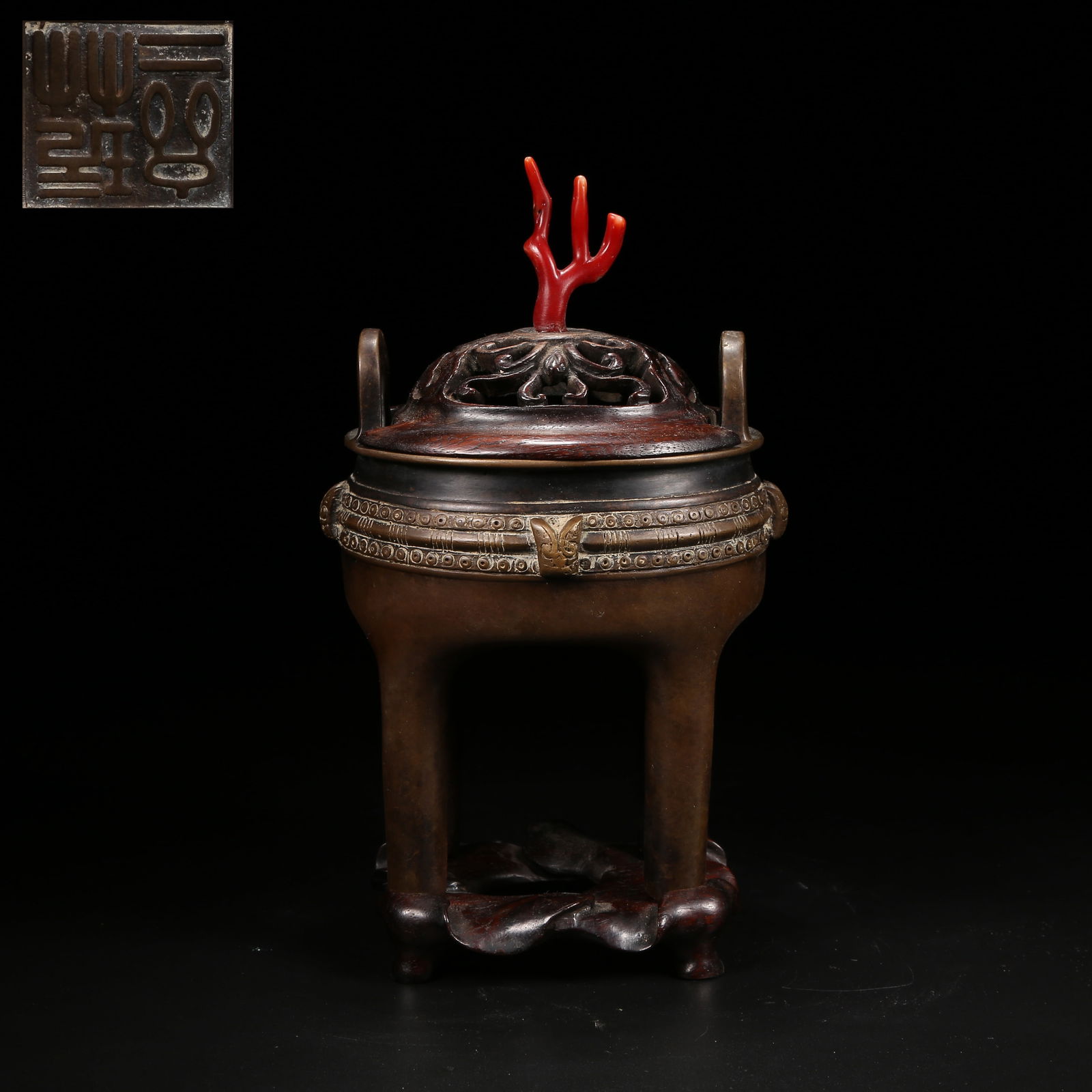 A BRONZE FOUR-LEGGED UPWARD-RISING HANDLE CENSER WITH BEAST-FACE PATTERN AND WIRE DECORATION: Bronze Four-Legged Upward-Rising Handle Censer with Beast-Face Pattern and Wire Decoration