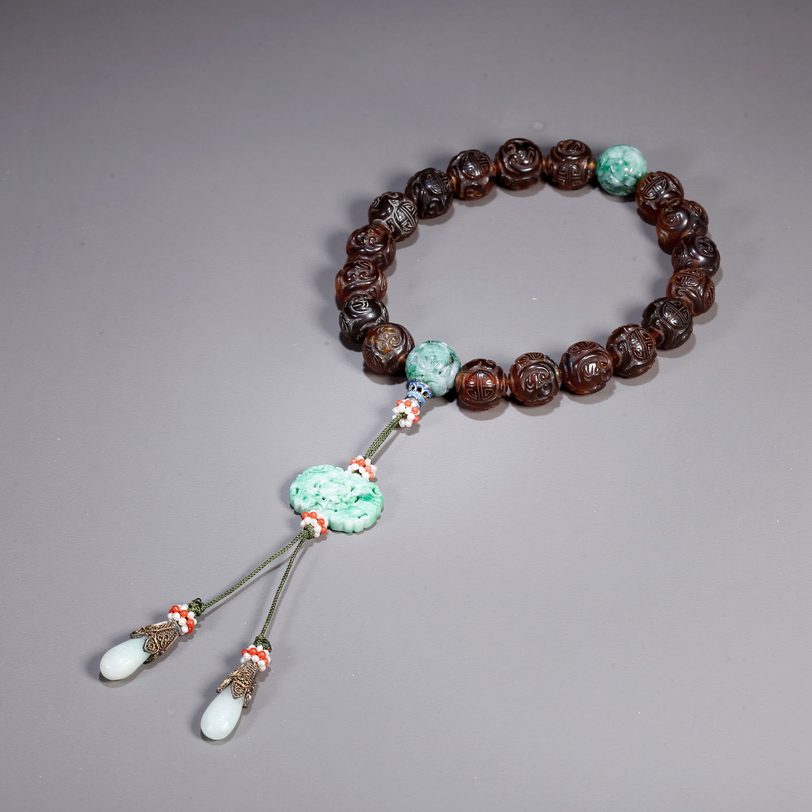 A AMBER CARVED BRACELET: Amber carved bracelet