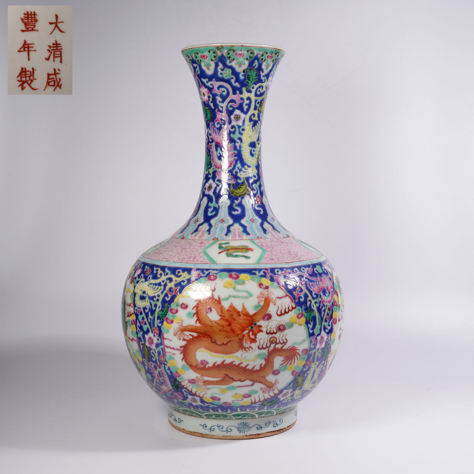 A GILT-RUBY-BLUE GROUND VASE WITH WINDOW PANELS AND OVERGLAZE RED-AND-GREEN DRAGON MOTIFS (1 of 9)