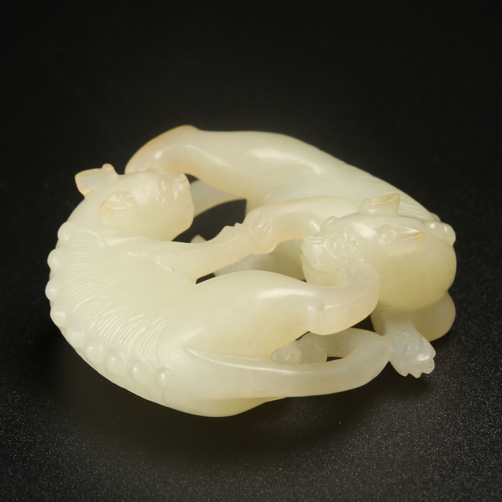 A HETIAN JADE DOUBLE-HAPPINESS PENDANT: Hetian Jade Double-Happiness Pendant