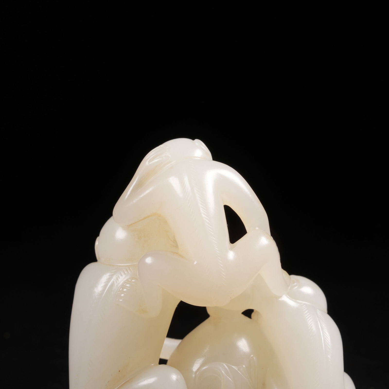 A HETIAN JADE MONKEY PRESENTING LONGEVITY FIGURE - 8