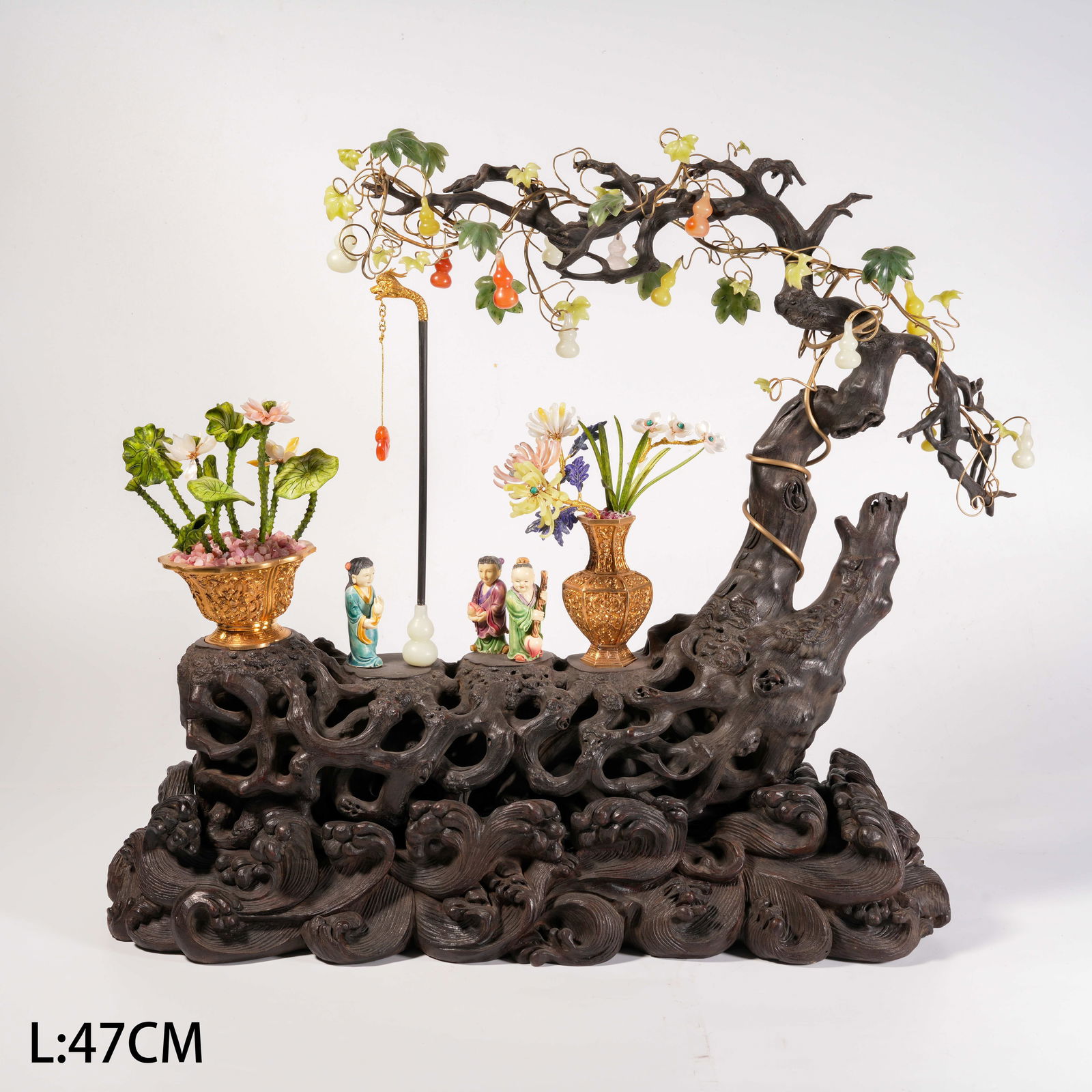 A ZITAN WOOD ORNAMENT WITH MULTI-TREASURE INLAY, IMMORTAL RIDING RAFT MOTIF: Zitan Wood Ornament with Multi-Treasure Inlay, Immortal Riding Raft Motif