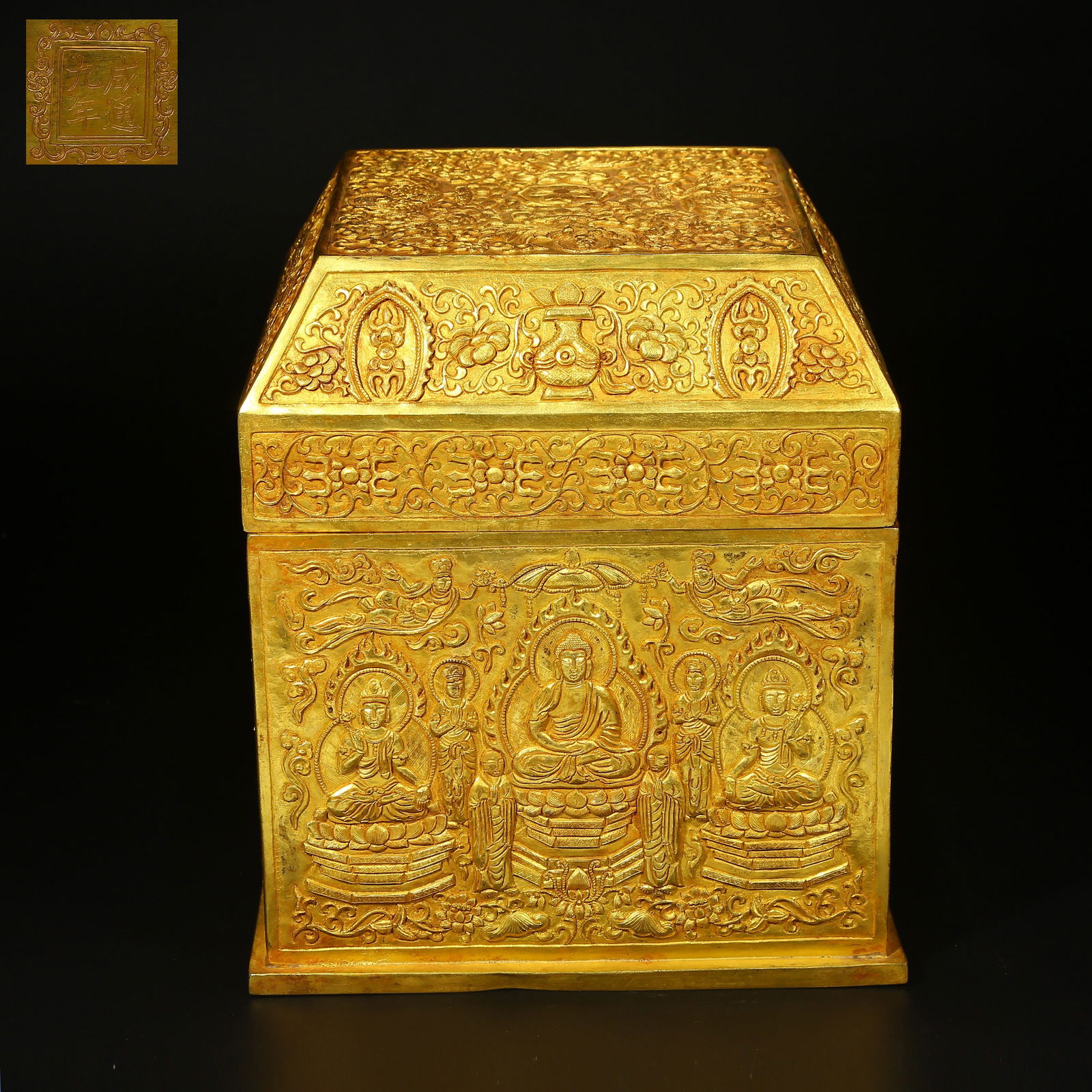 A GILT BRONZE BUDDHIST IMAGE SCRIPTURE CHEST: Gilt bronze Buddhist image scripture chest