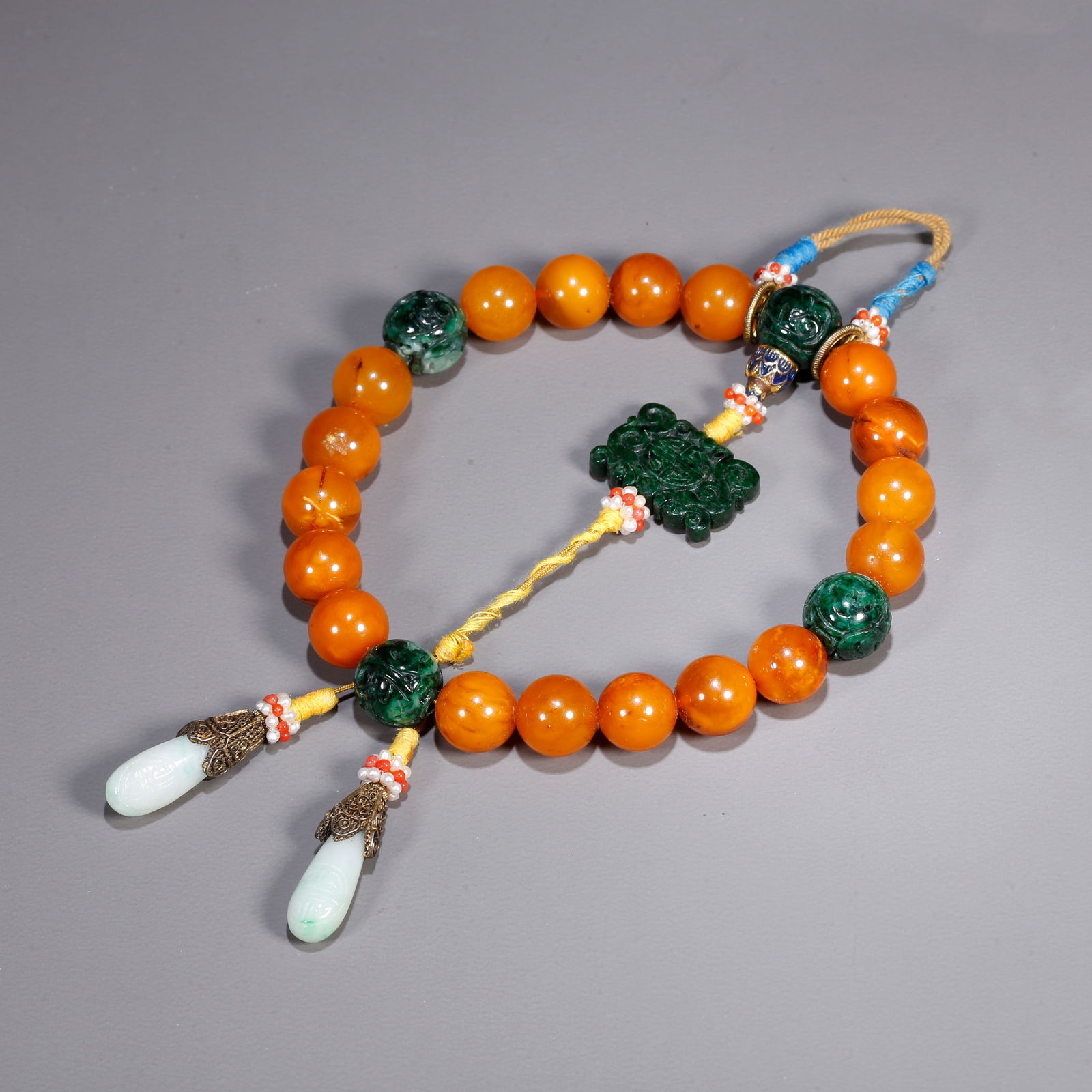 A AMBER CARVED BRACELET: Amber carved bracelet