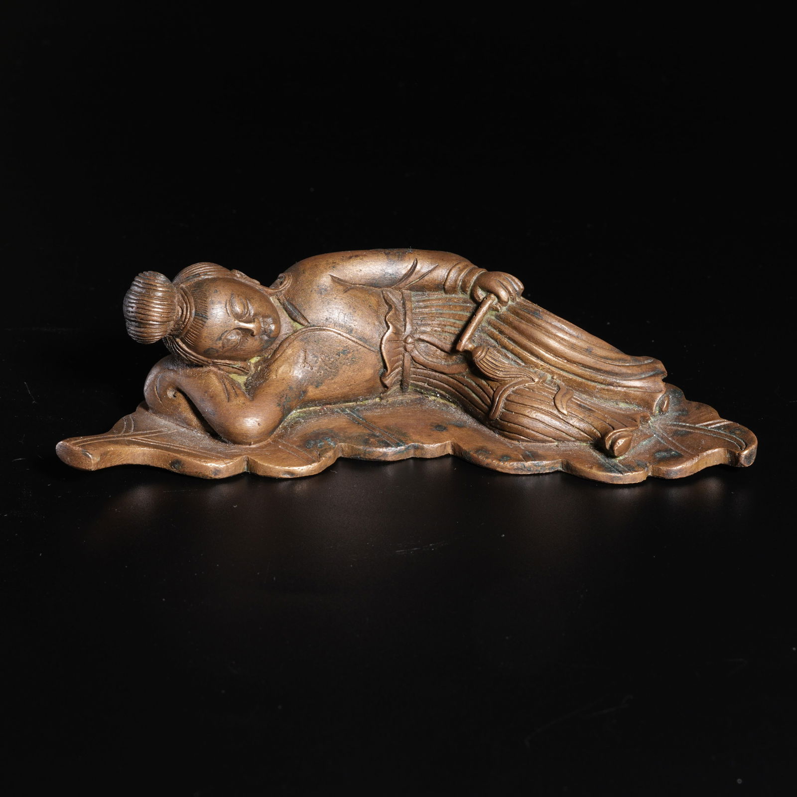 A BRONZE FEMALE FIGURE PAPERWEIGHT: Bronze Female Figure Paperweight