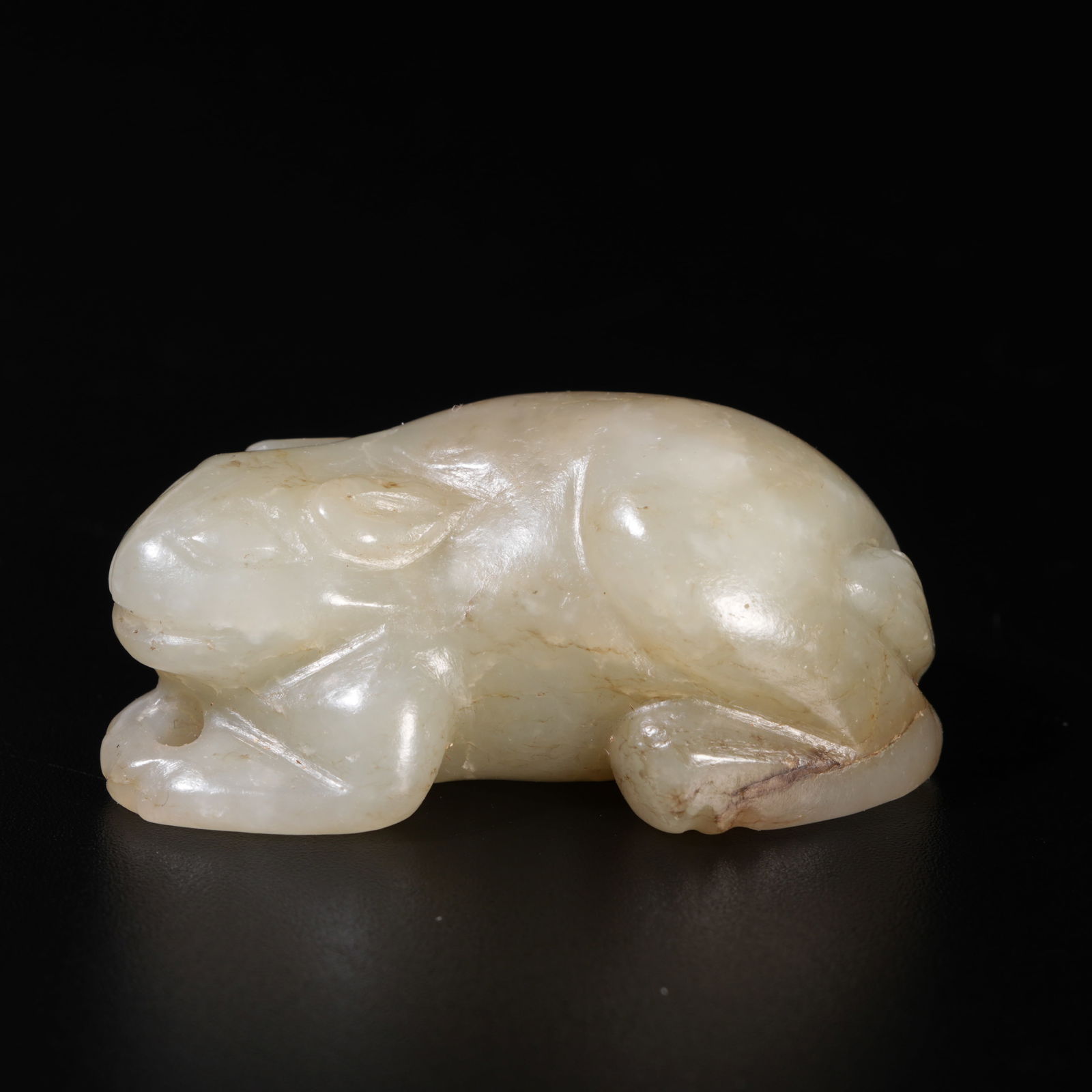 A HETIAN JADE CARVED FROG-SHAPED PENDANT: Hetian Jade Carved Frog-Shaped Pendant