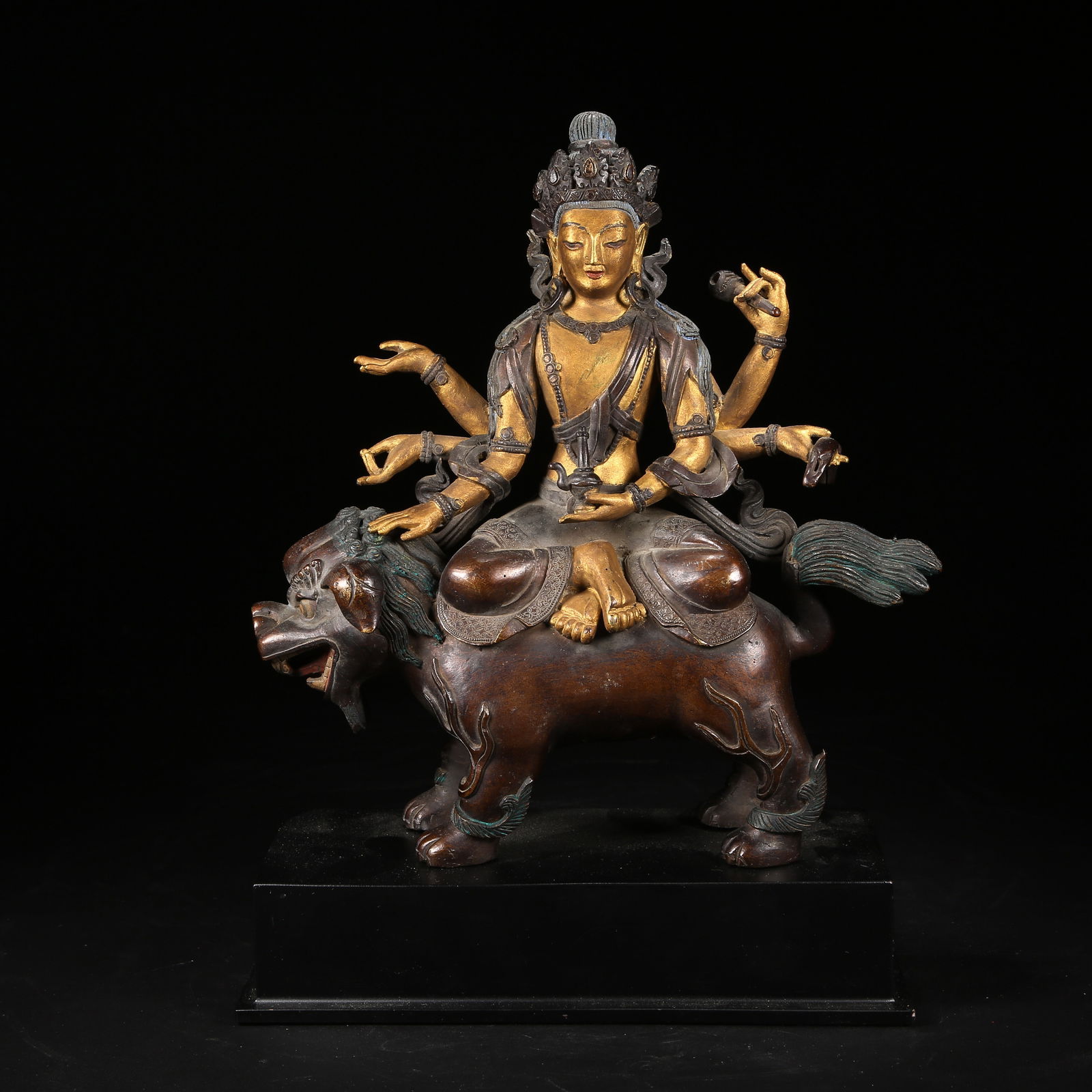 A BRONZE AND GILT SIX-ARMED MAITREYA BODHISATTVA STATUE IN SIX-TIERED STUPA STYLE (1 of 8)