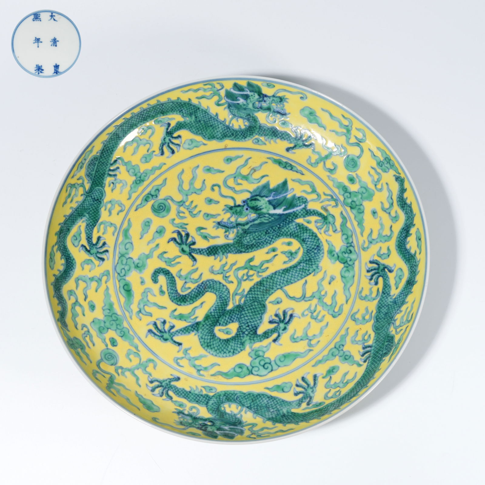 A YELLOW-GROUND GREEN-GLAZED PLATE WITH CLOUD-AND-DRAGON MOTIF (1 of 9)