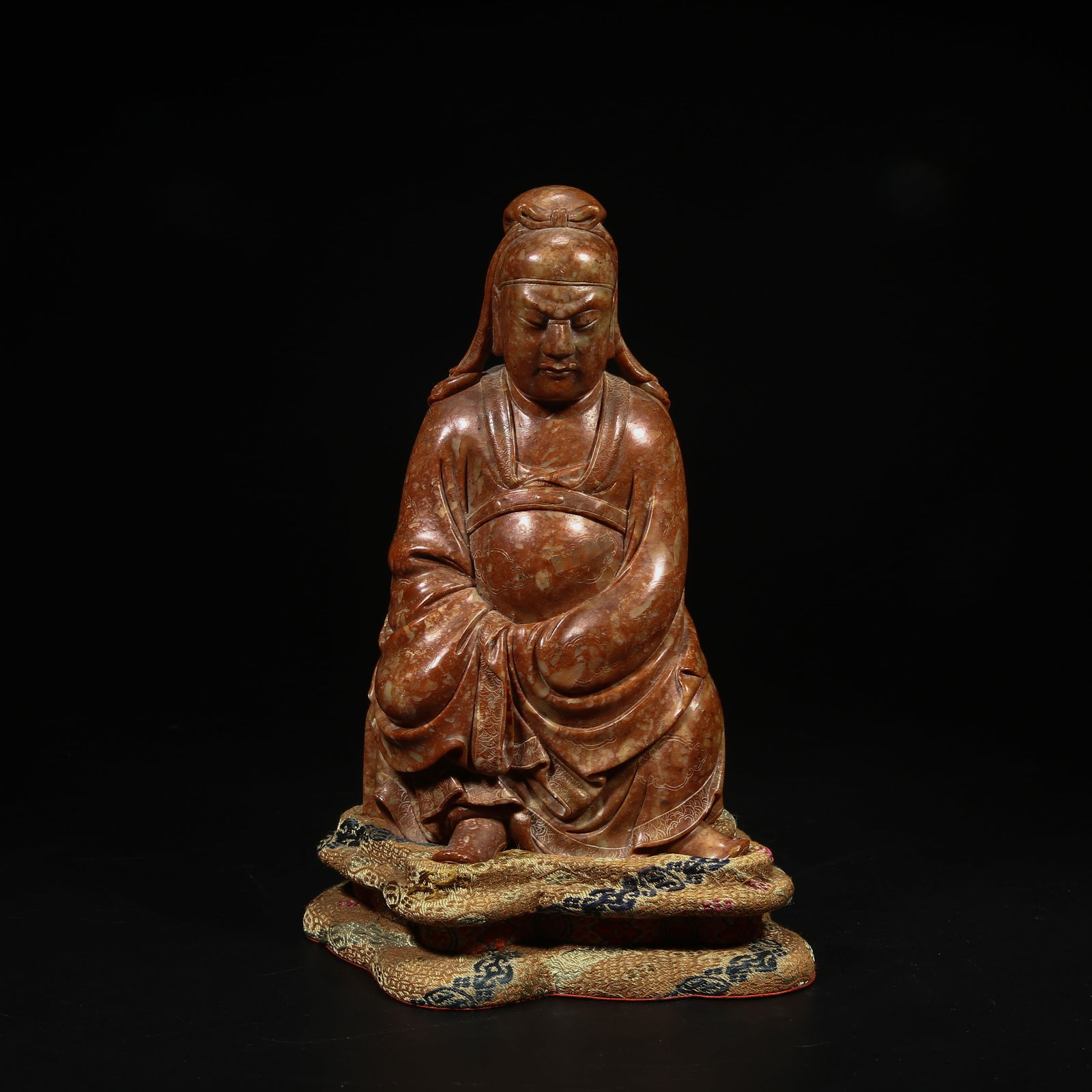 A SHOUSHAN STONE SEATED STATUE OF GUAN YU: Shoushan stone seated statue of Guan Yu