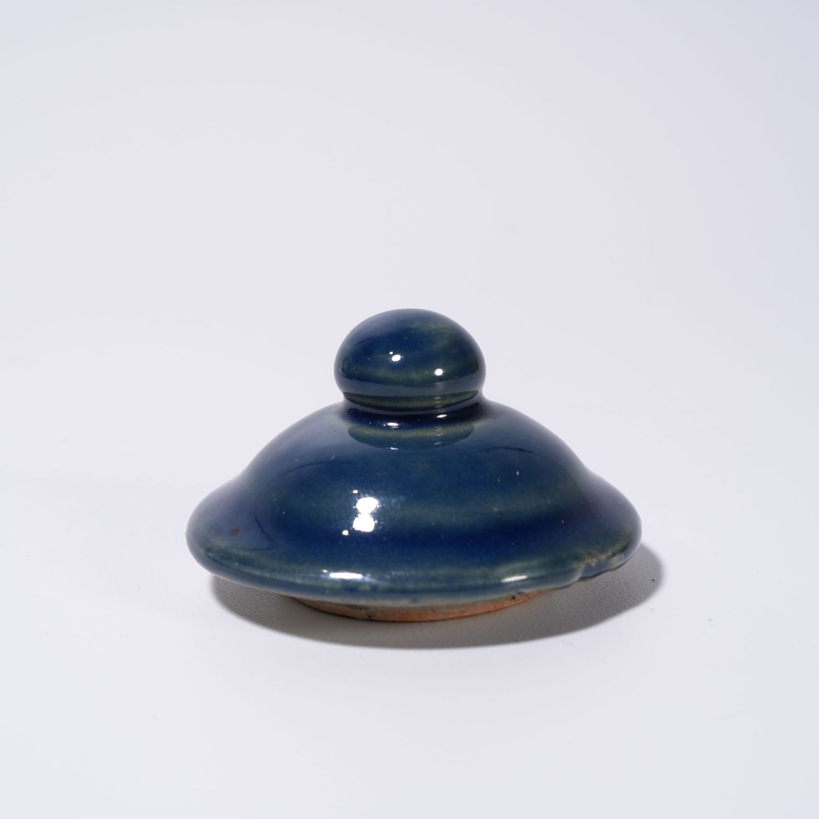 A BLUE-GLAZED COVERED JAR - 9