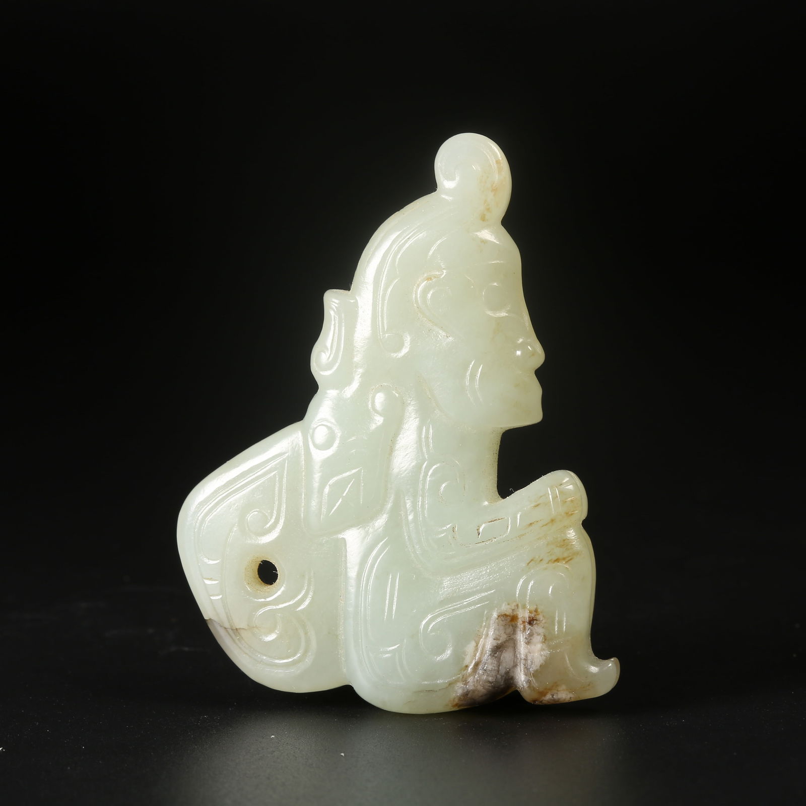 A ARCHAIC JADE DEITY FIGURE (1 of 8)