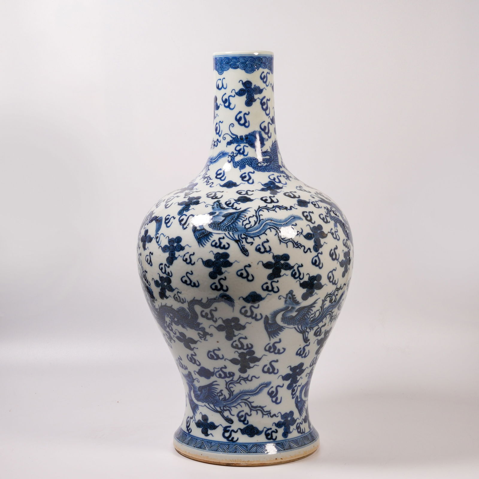 A BLUE-AND-WHITE VASE WITH DRAGON-AND-PHOENIX DESIGN (1 of 9)