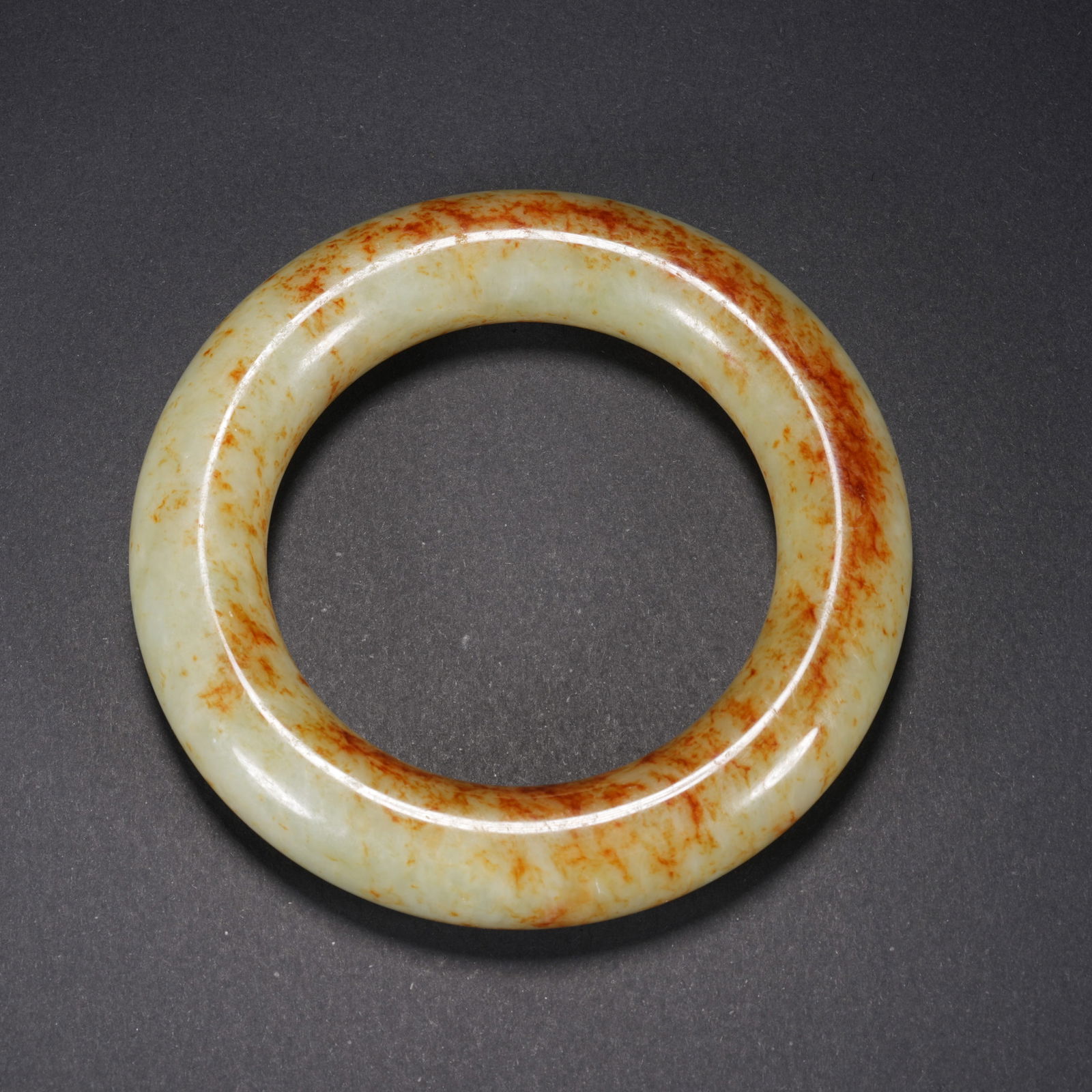 A HETIAN JADE CARVED BANGLE (1 of 9)