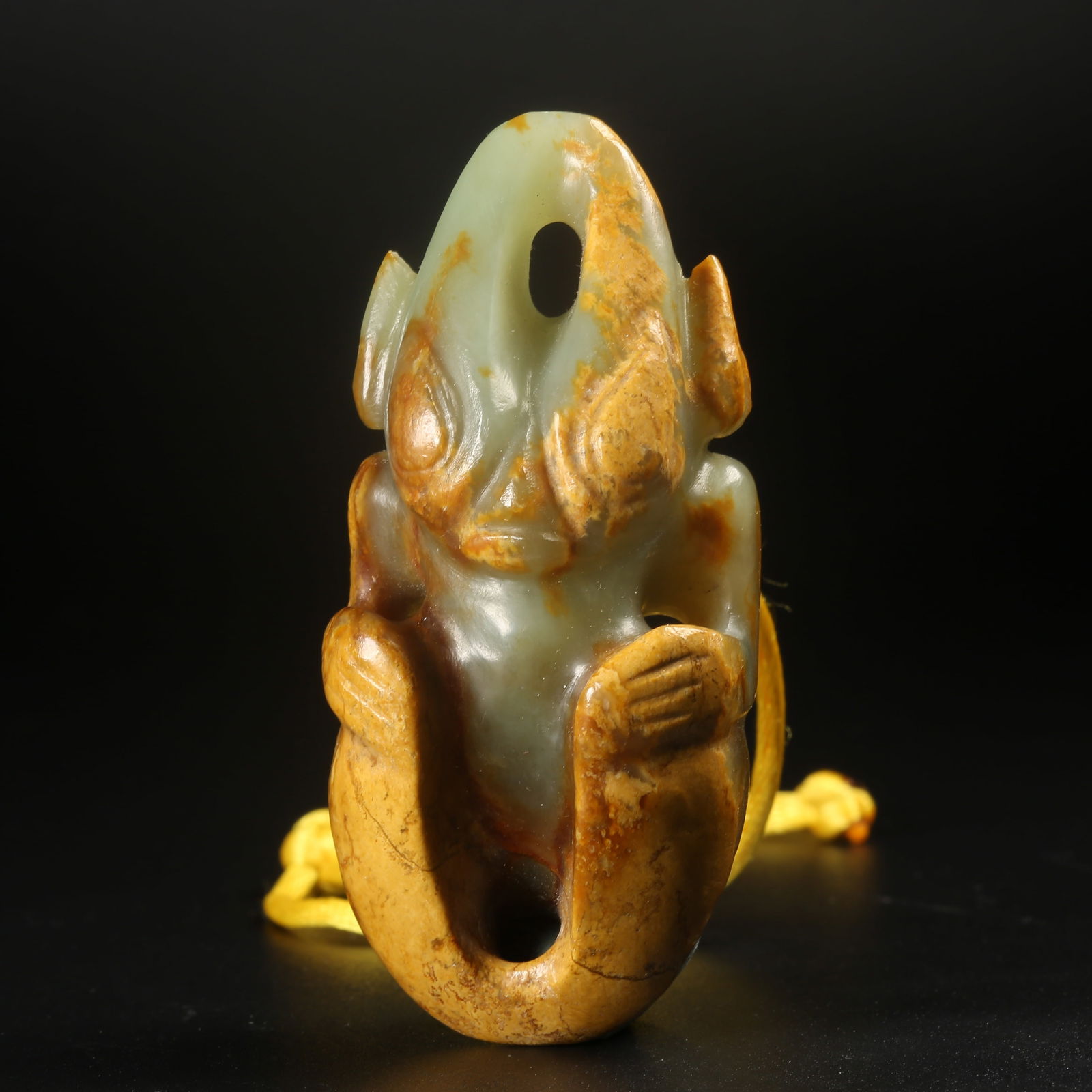 A ARCHAIC JADE SUN GOD PENDANT (1 of 8)