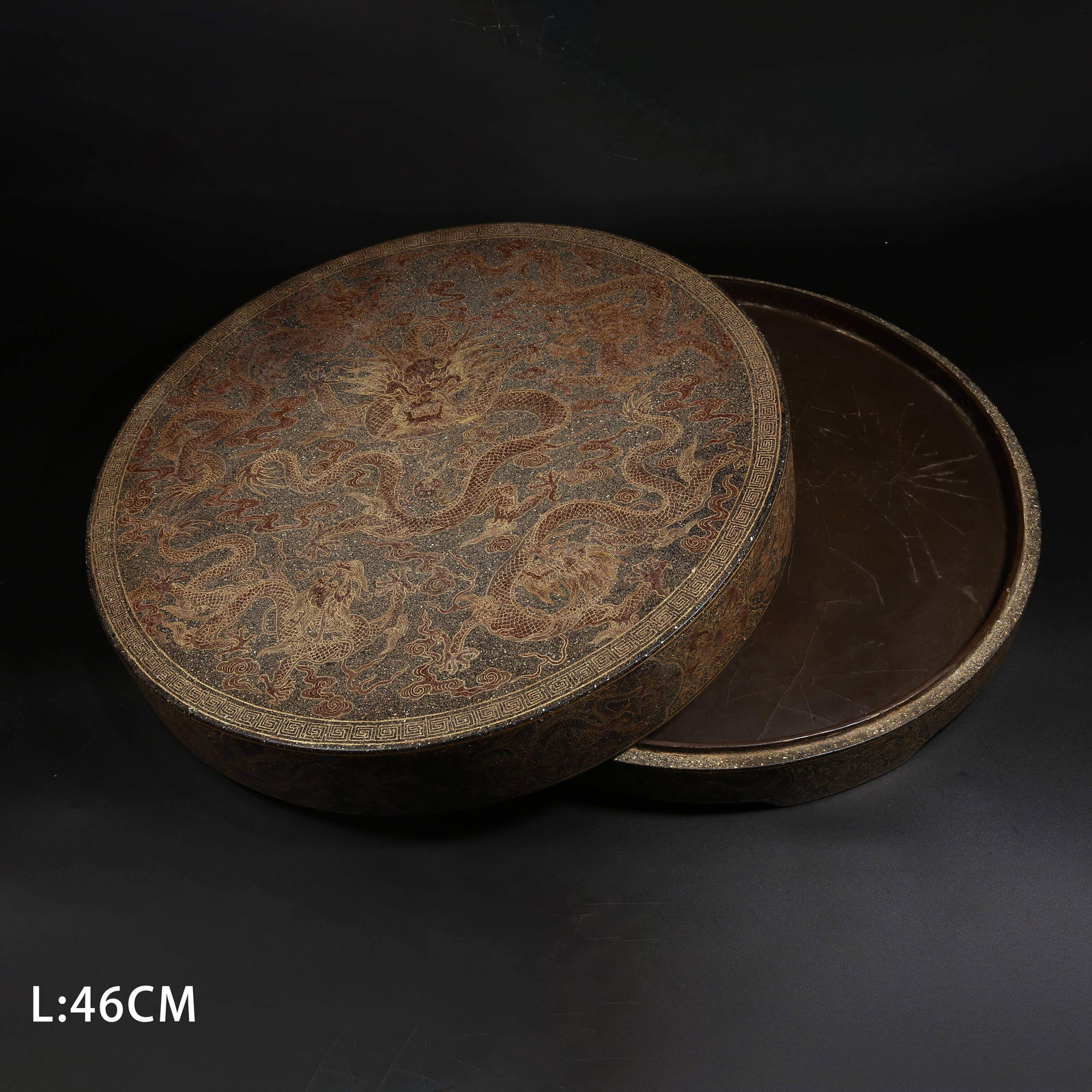 A LACQUER BOX WITH GILT-INCISED CLOUD AND DRAGON MOTIF: Lacquer Box with Gilt-Incised Cloud and Dragon Motif