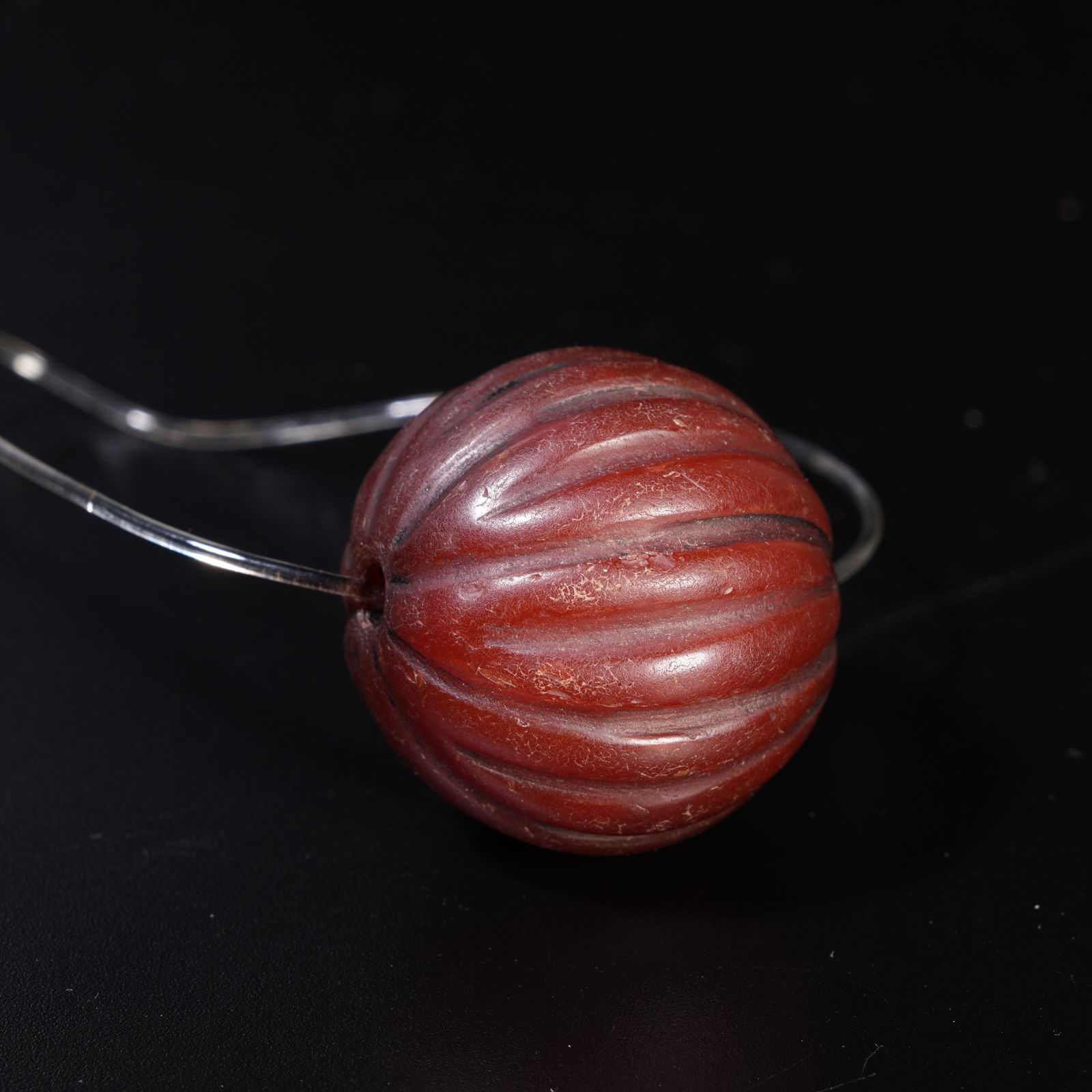 A SOUTHERN RED AGATE CARVED PENDANT: Southern Red Agate Carved Pendant