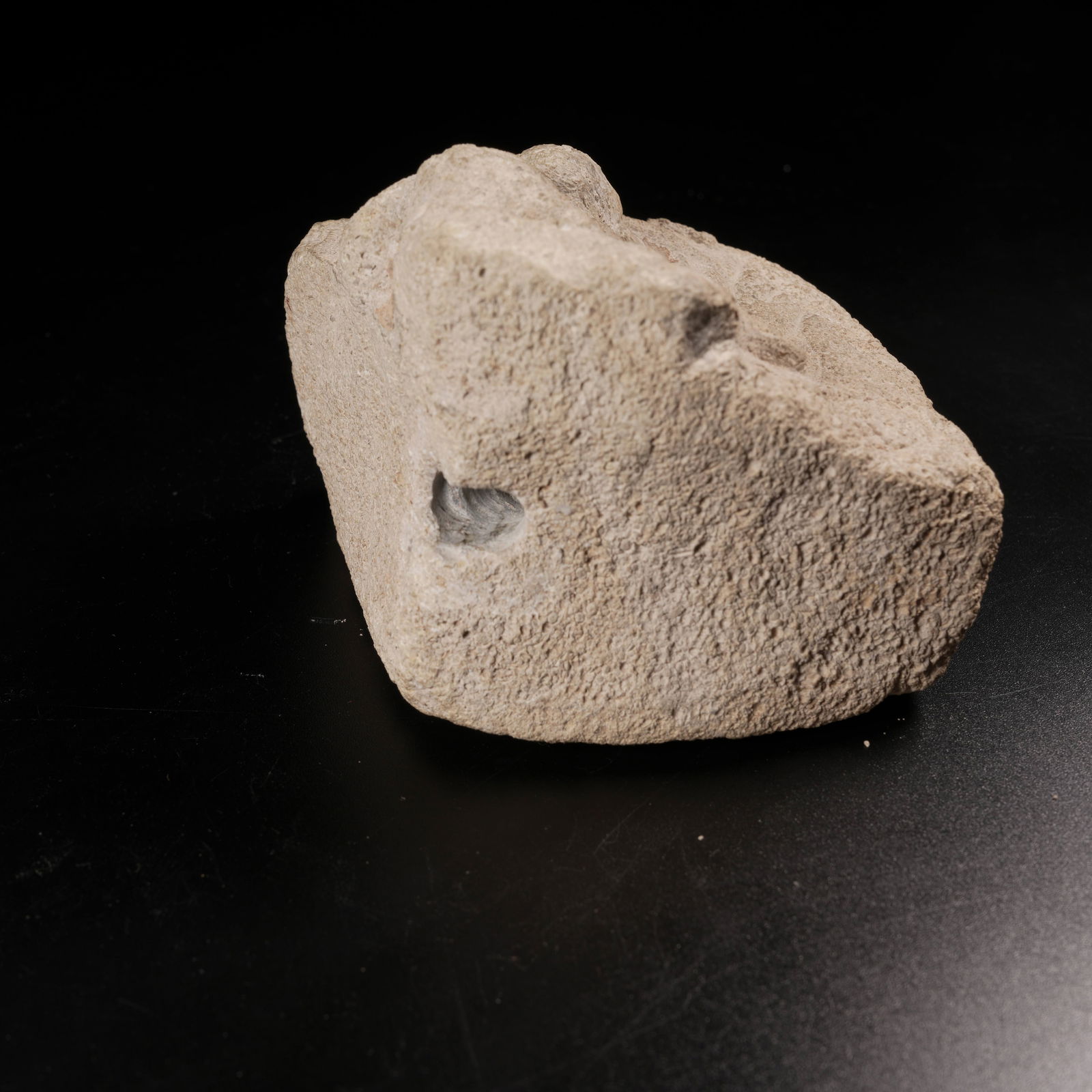 A STONE FEITIAN FIGURE - 8