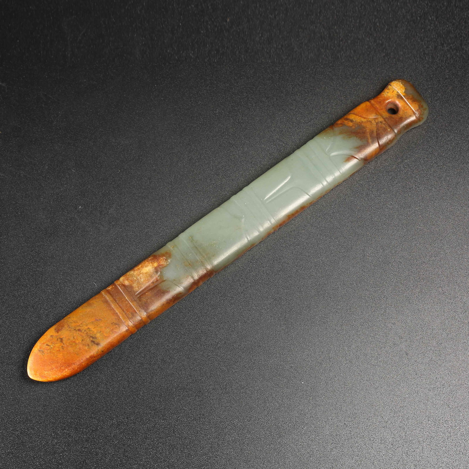A ARCHAIC JADE HANDLE-SHAPED OBJECT: Archaic Jade Handle-Shaped Object