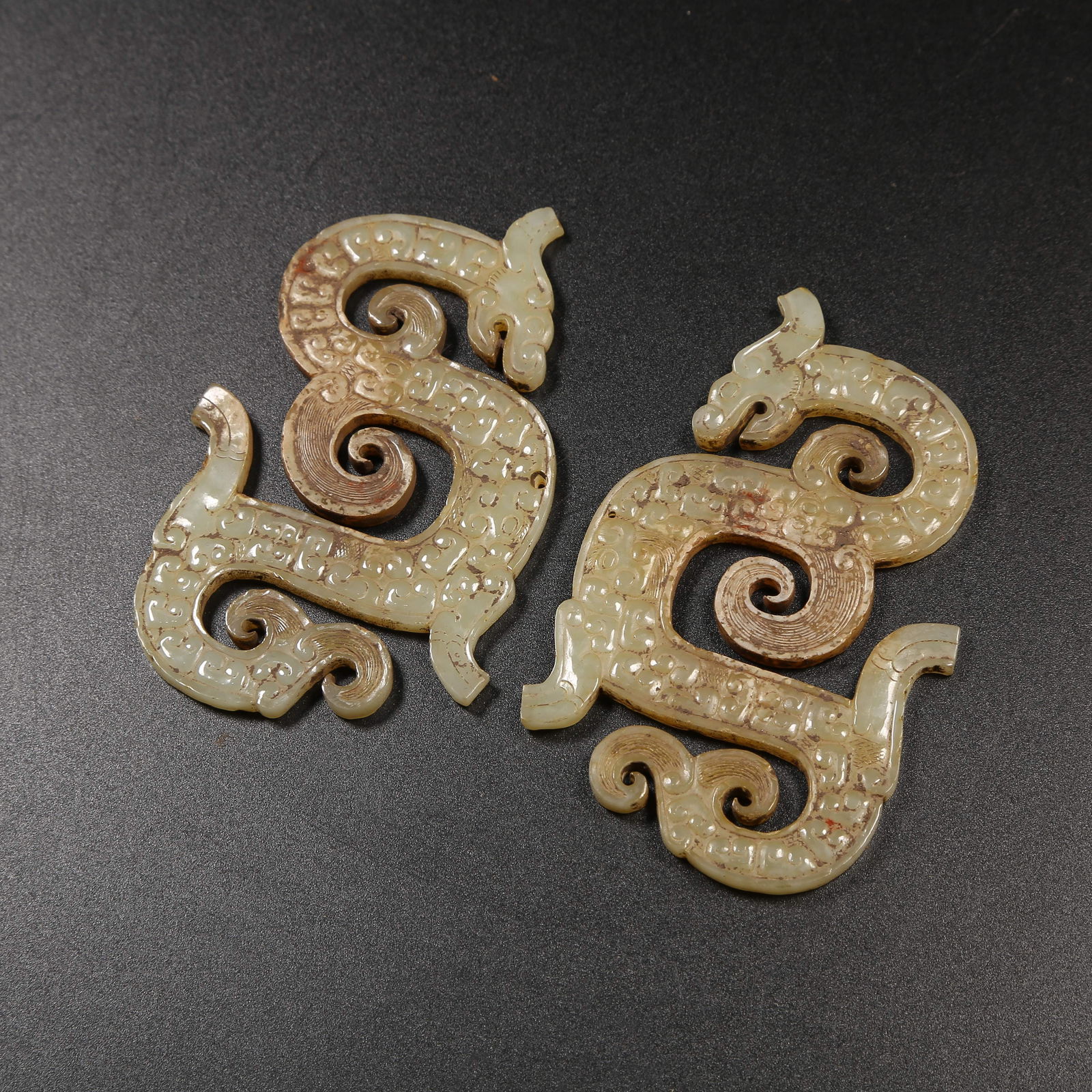 A SET OF ANCIENT JADE DRAGON PENDANTS: Set of Ancient Jade Dragon Pendants