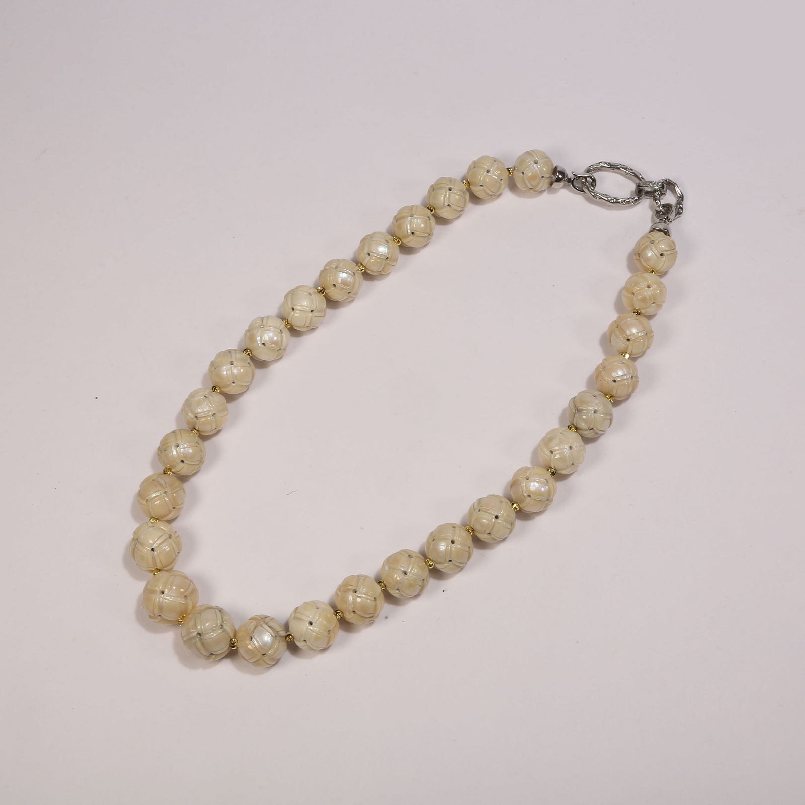 A SINGLE STRAND NATURAL PEARL NECKLACE (1 of 8)