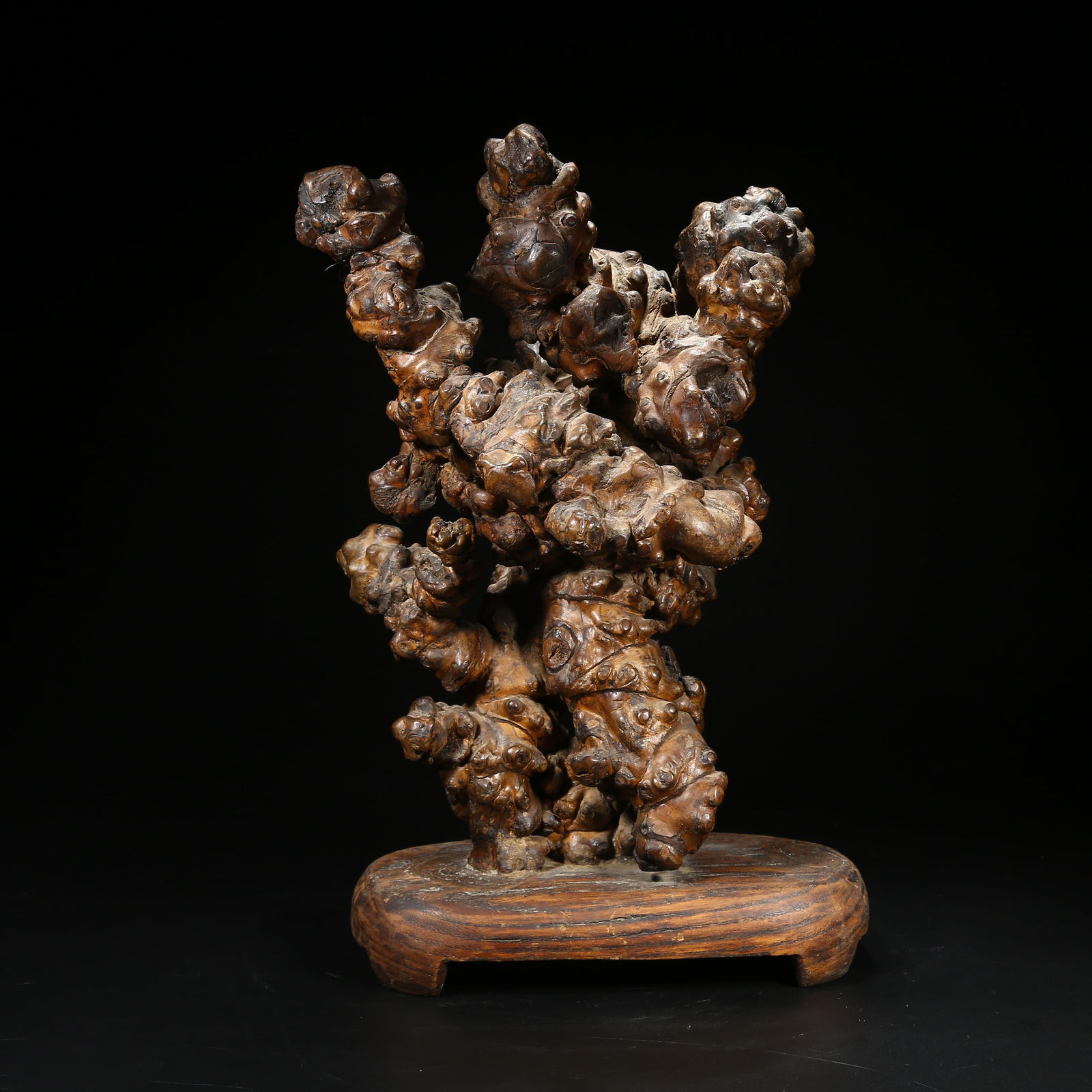 A BURL WOOD MOUNTAIN-SHAPED ORNAMENT TITLED "UNIFIED RIVERS AND MOUNTAINS": Burl wood mountain-shaped ornament titled "Unified Rivers and Mountains"