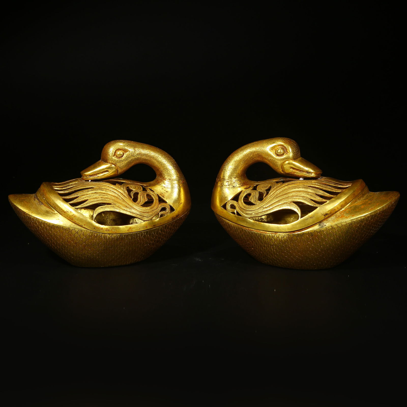 A GILT BRONZE TREASURE DUCK INCENSE BURNER: Gilt bronze treasure duck incense burner