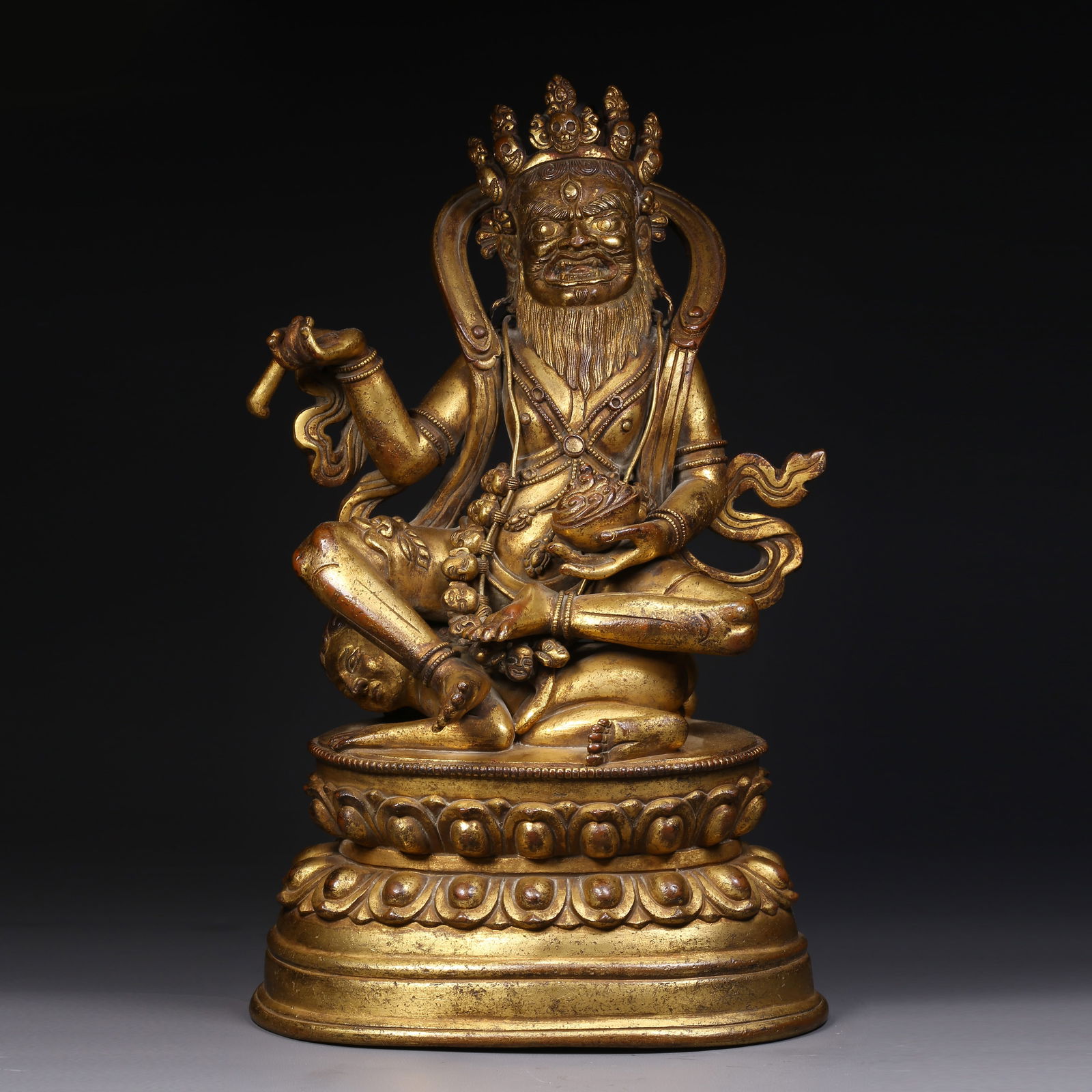 A GILDED BRONZE MAH?K?LA BRAHMIN FORM STATUE: Gilded bronze Mah?k?la Brahmin form statue