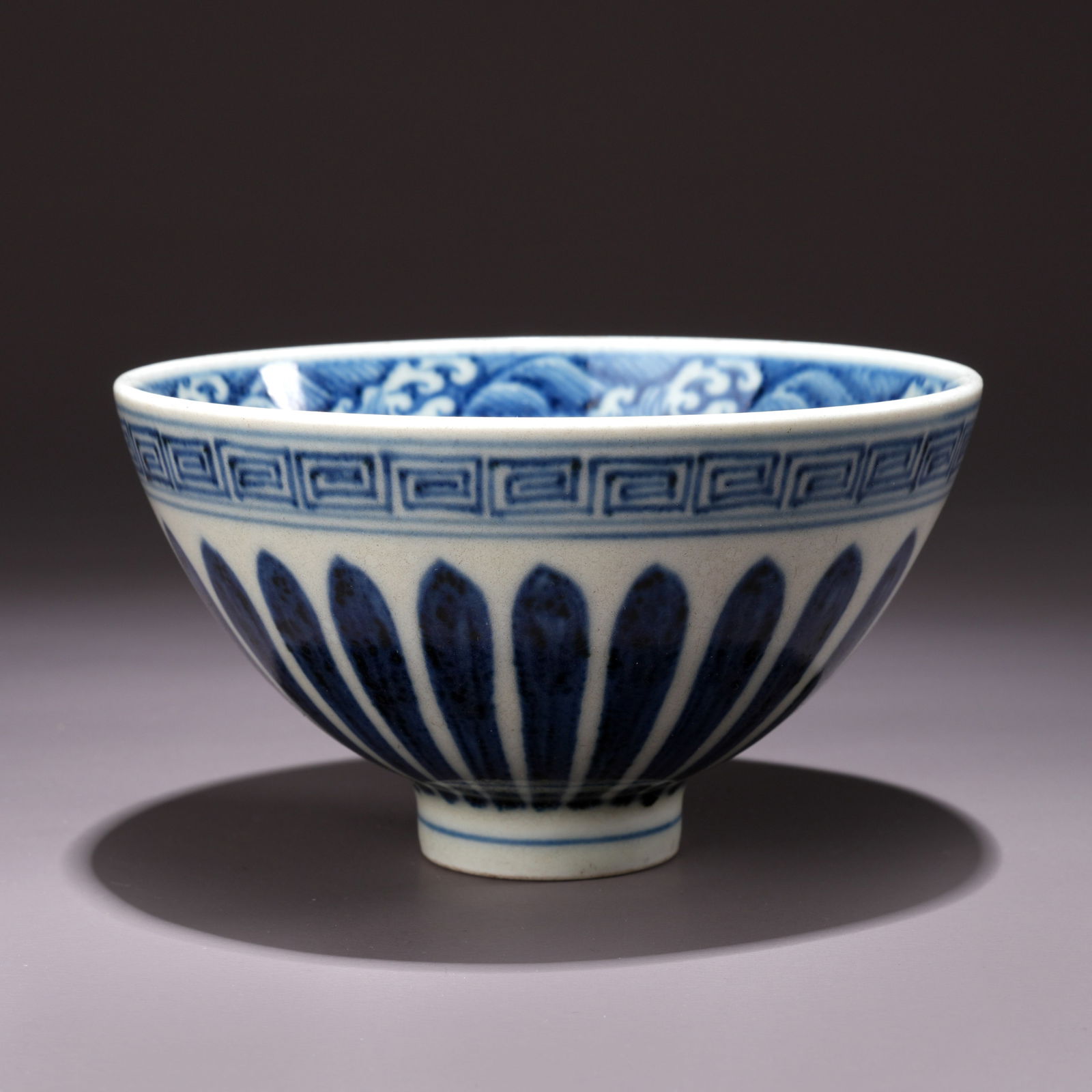 A BLUE-AND-WHITE BOWL WITH LIANHUA FLOWER MOTIFS (1 of 8)