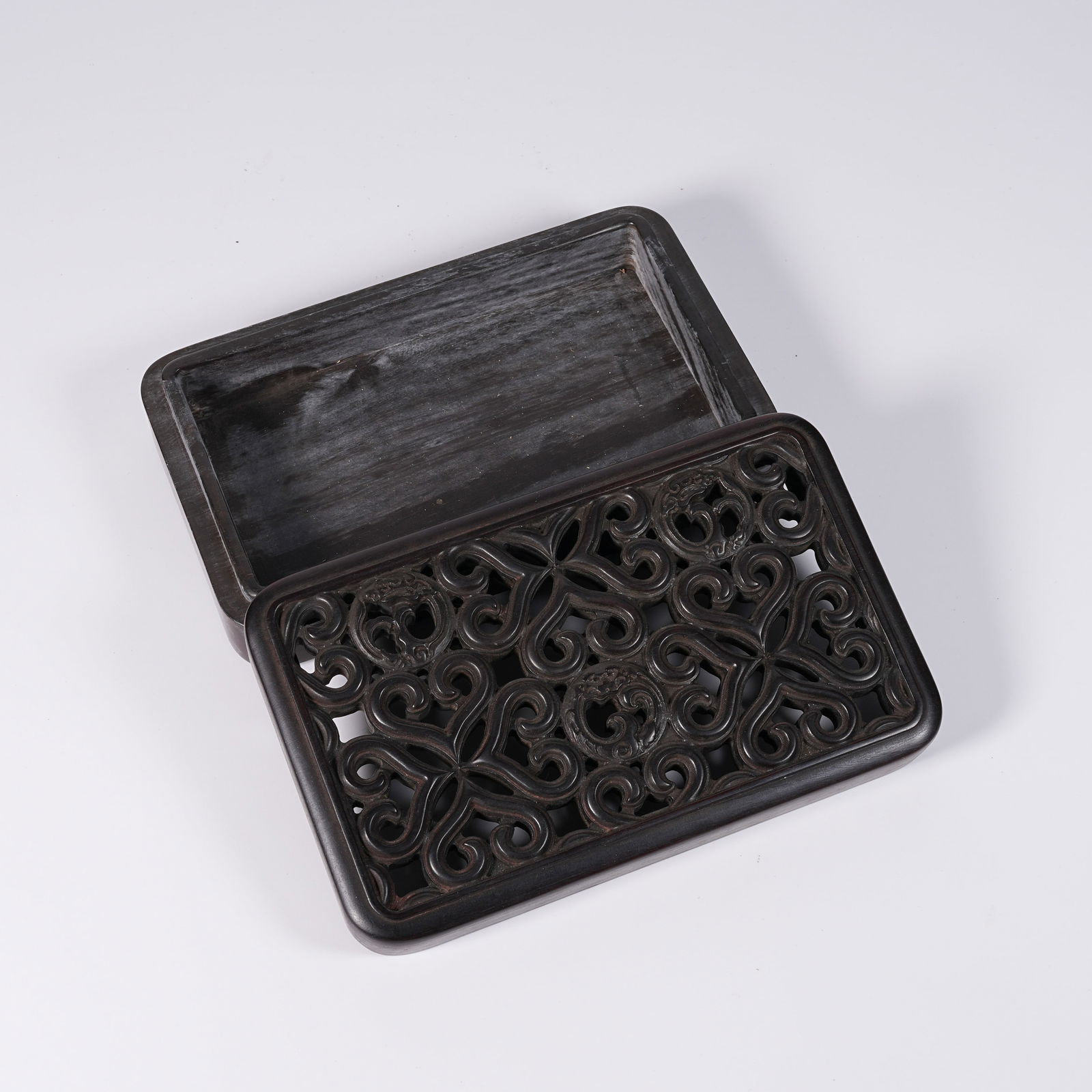 A ZITAN WOOD FLORAL-PATTERN INKSTONE BOX: Zitan Wood Floral-Pattern Inkstone Box