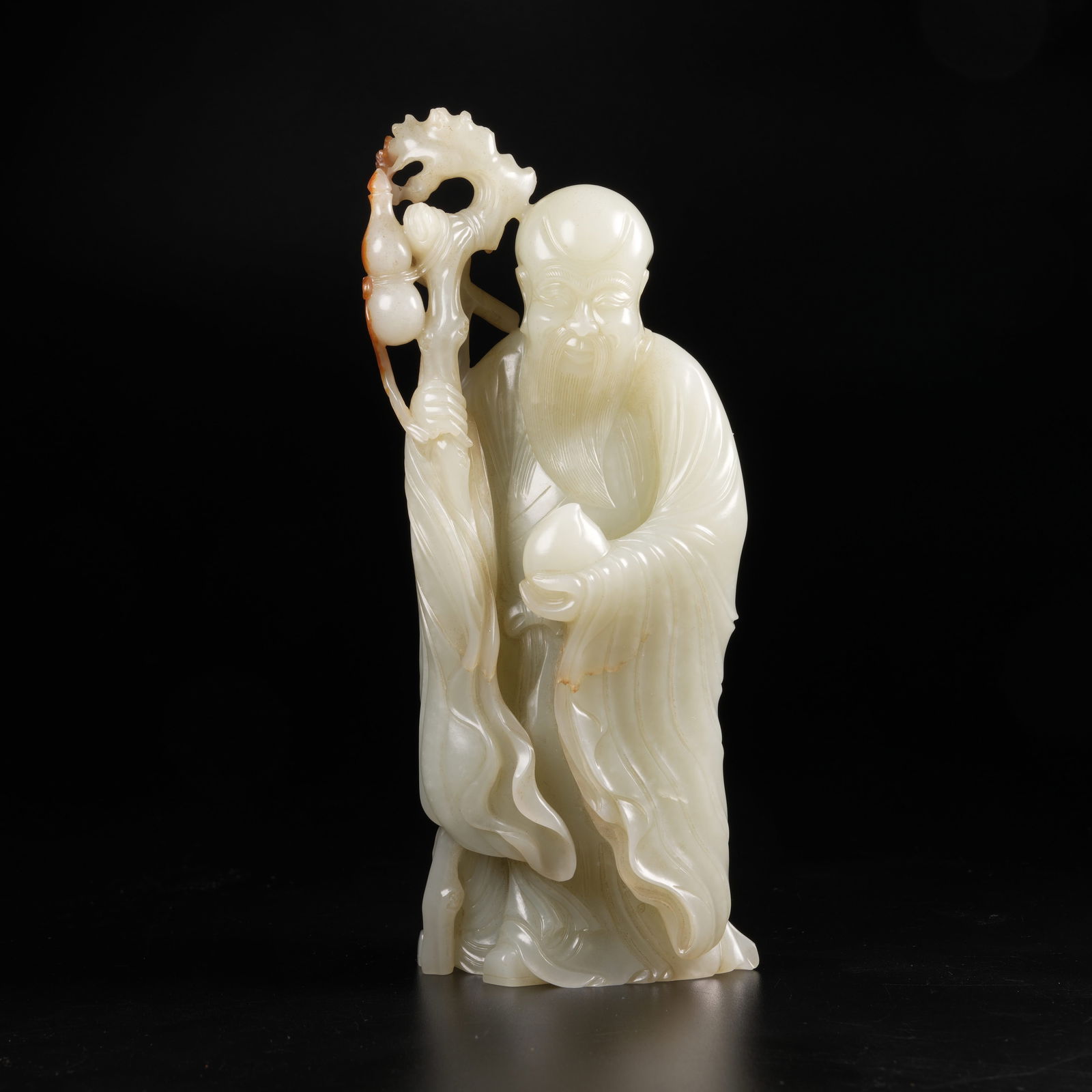 A HETIAN JADE SHOUXING FIGURE (1 of 8)