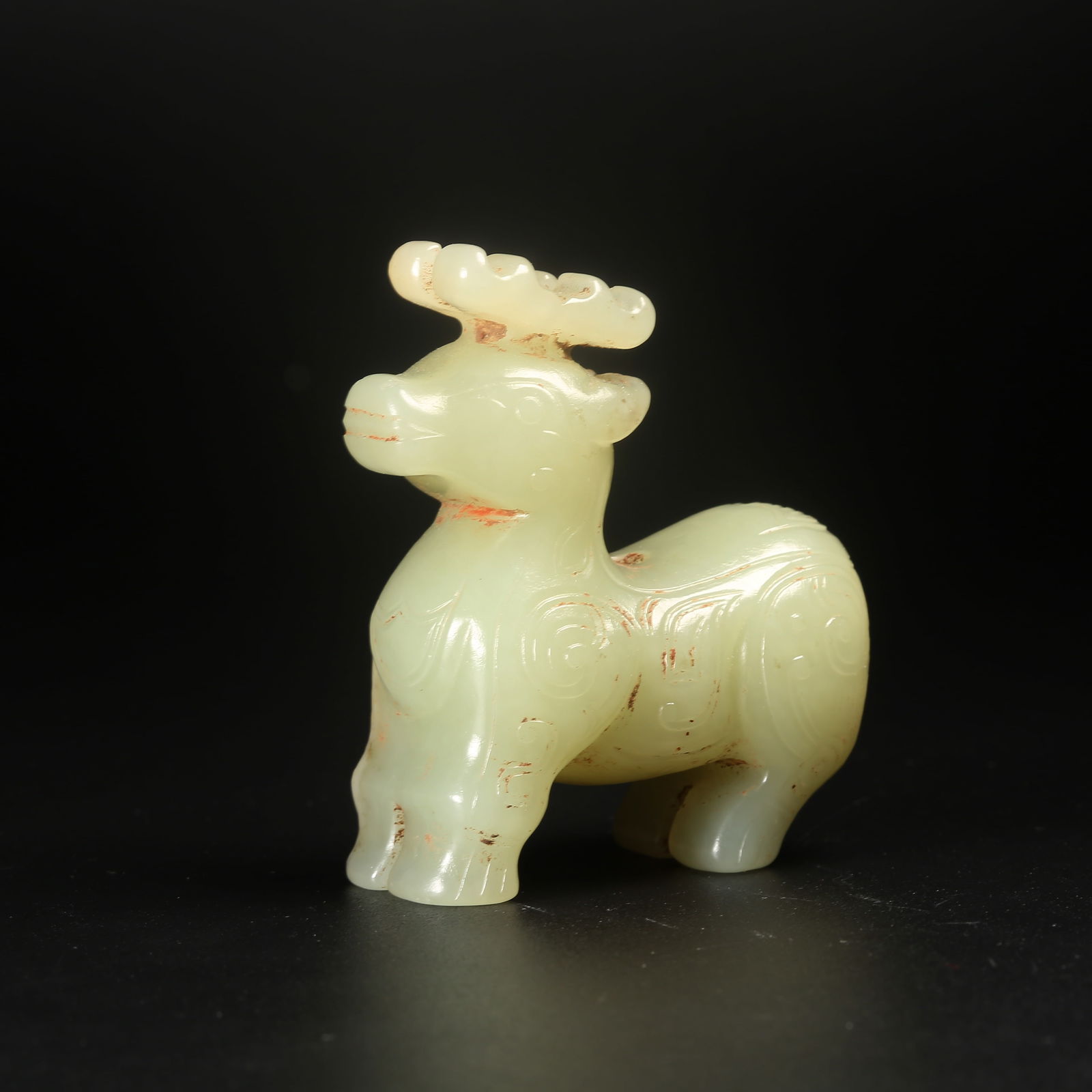 A ARCHAIC JADE AUSPICIOUS DEER FIGURINE: Archaic Jade Auspicious Deer Figurine