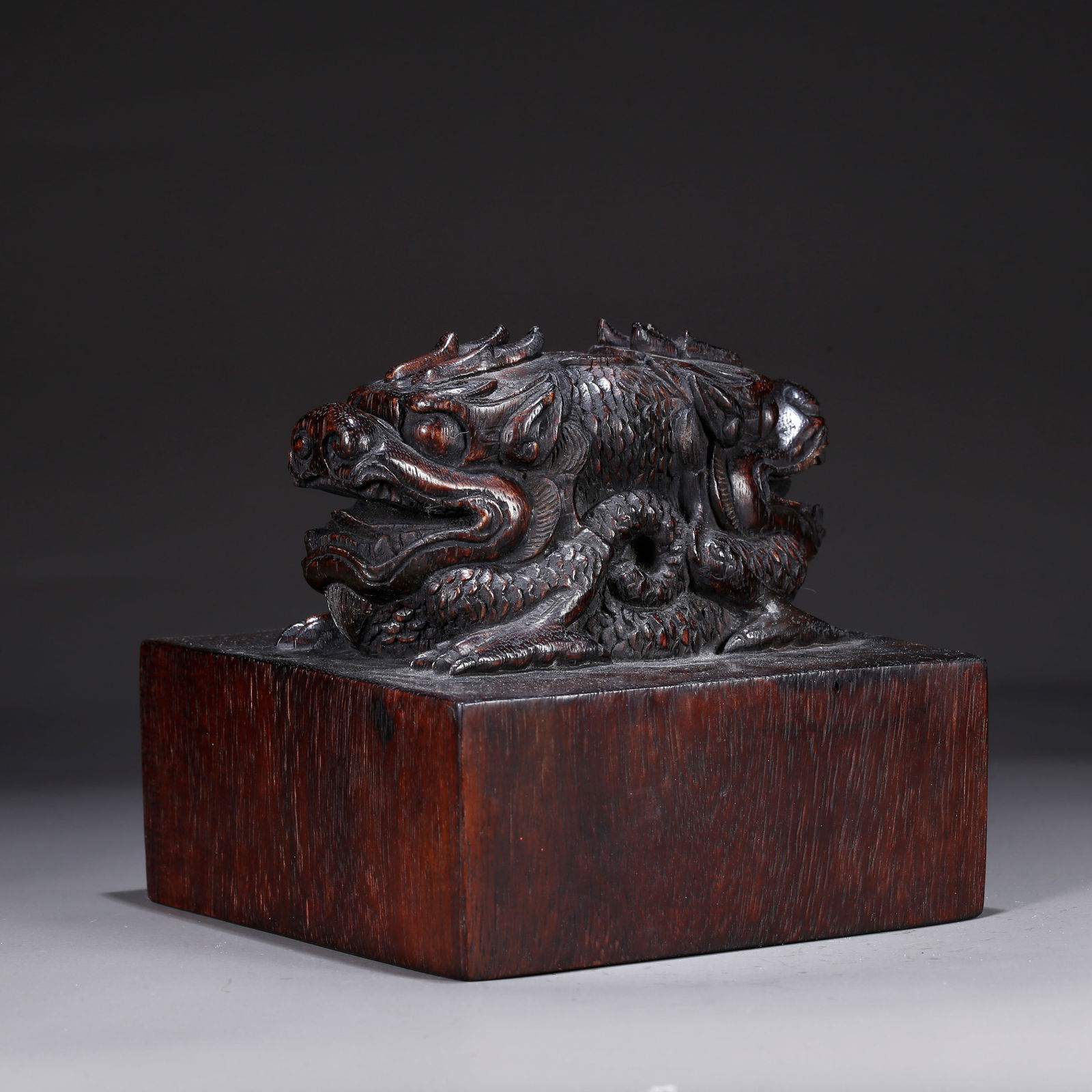 A SANDALWOOD CARVING OF A DOUBLE-DRAGON SEAL: Sandalwood carving of a double-dragon seal