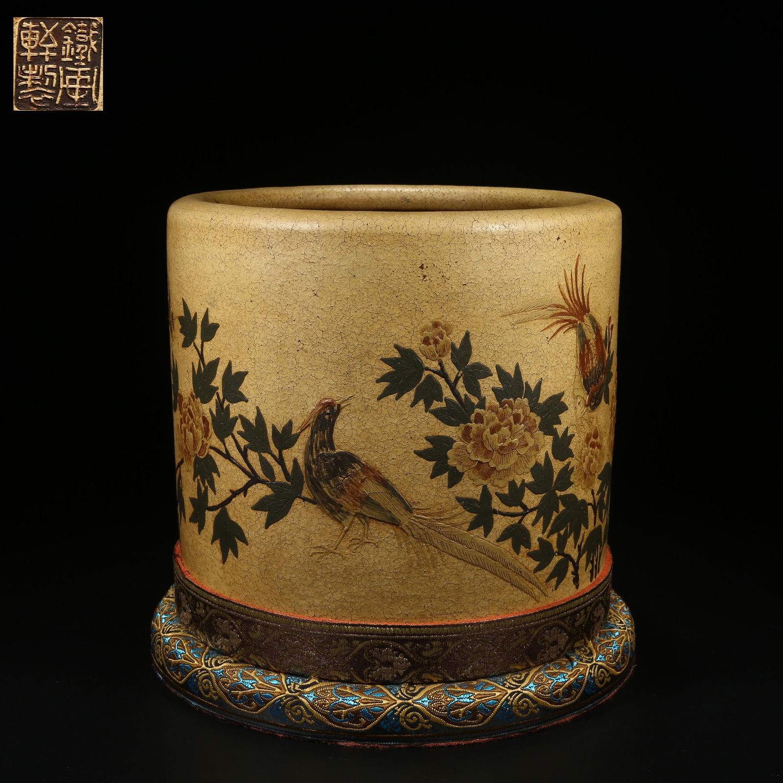 A ZISHA (PURPLE CLAY) BRUSH POT WITH BLOOMING PROSPERITY FLOWERS: Zisha (purple clay) brush pot with blooming prosperity flowers