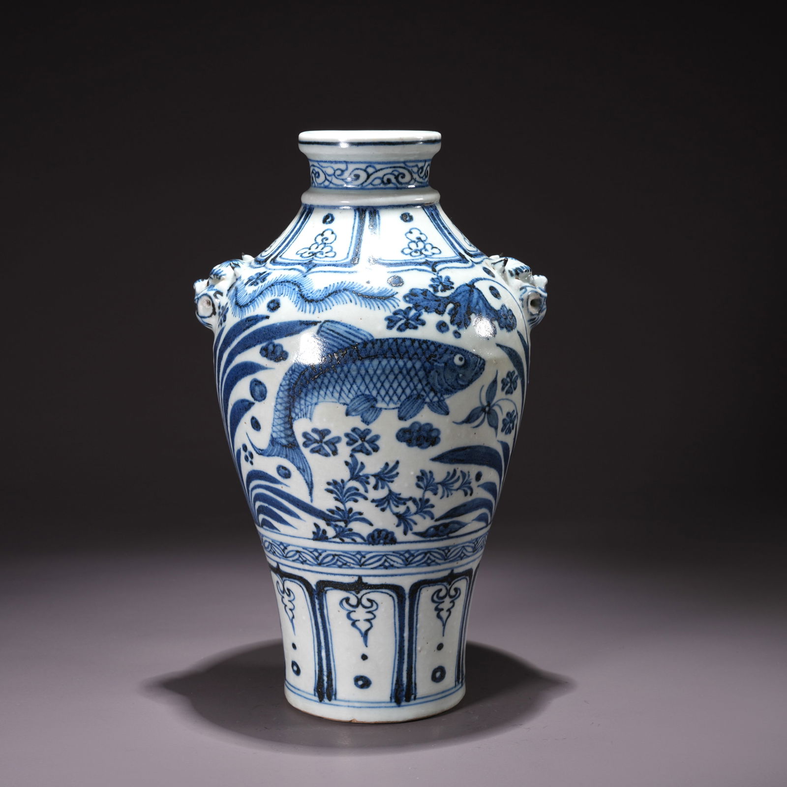 A BLUE-AND-WHITE DOUBLE-BEAST-HANDLED VASE WITH FISH AND ALGAE MOTIFS: Blue-and-White Double-Beast-Handled Vase with Fish and Algae Motifs