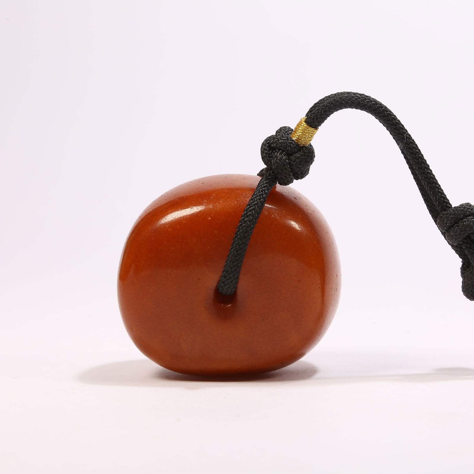 A AMBER PENDANT: Amber pendant