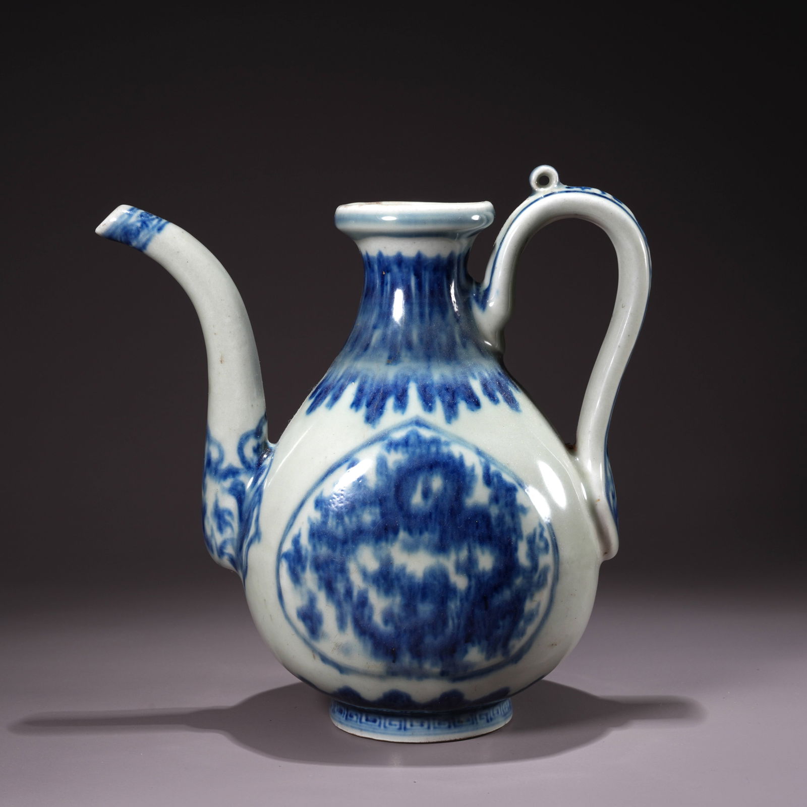 A BLUE-AND-WHITE EWER: Blue-and-White Ewer
