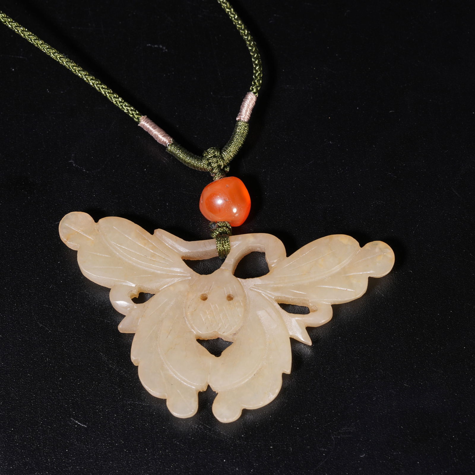 A HETIAN JADE CARVED BUTTERFLY-SHAPED PENDANT (1 of 7)