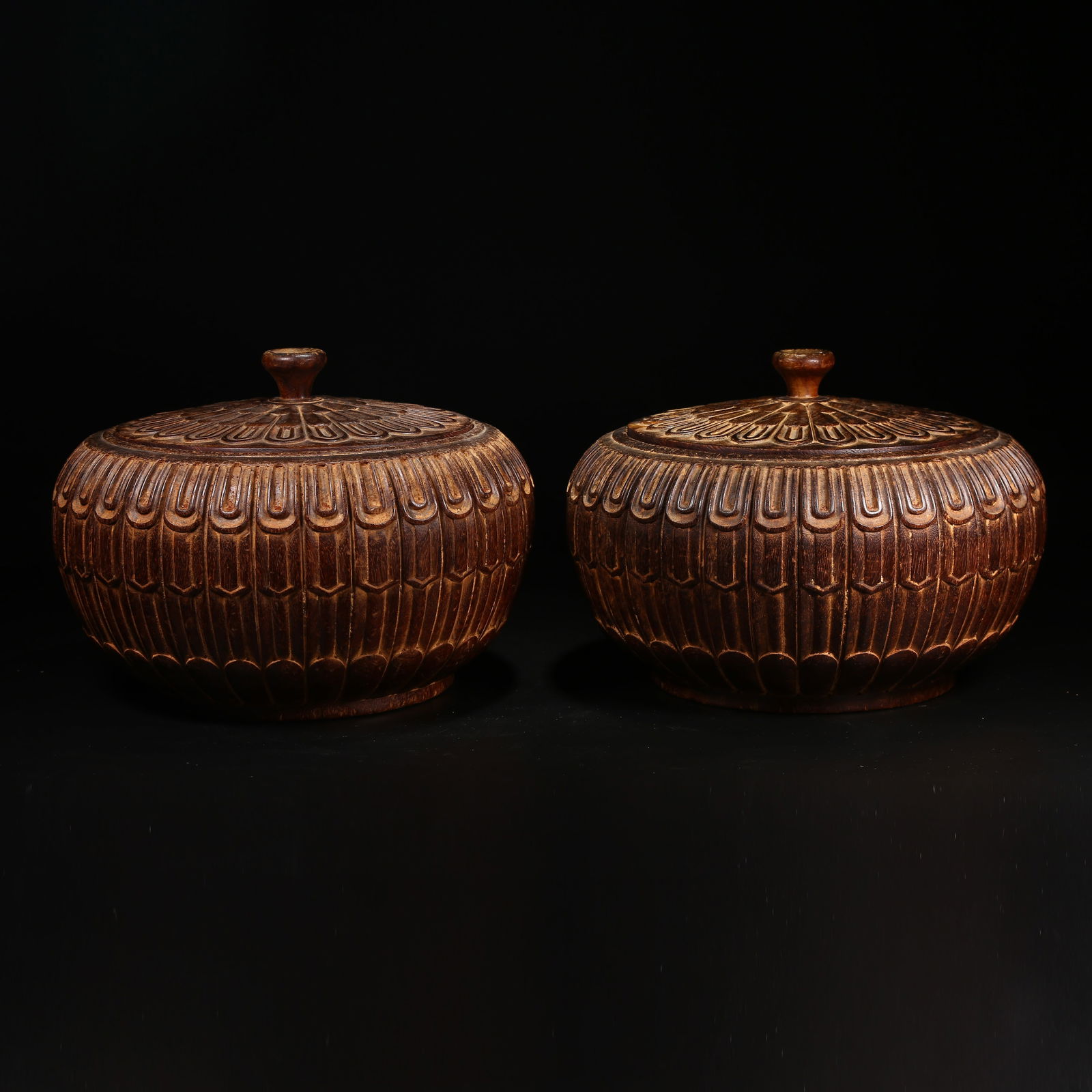 A SET OF ZITAN LIDDED JARS WITH CHRYSANTHEMUM PETAL DESIGN: Set of Zitan Lidded Jars with Chrysanthemum Petal Design